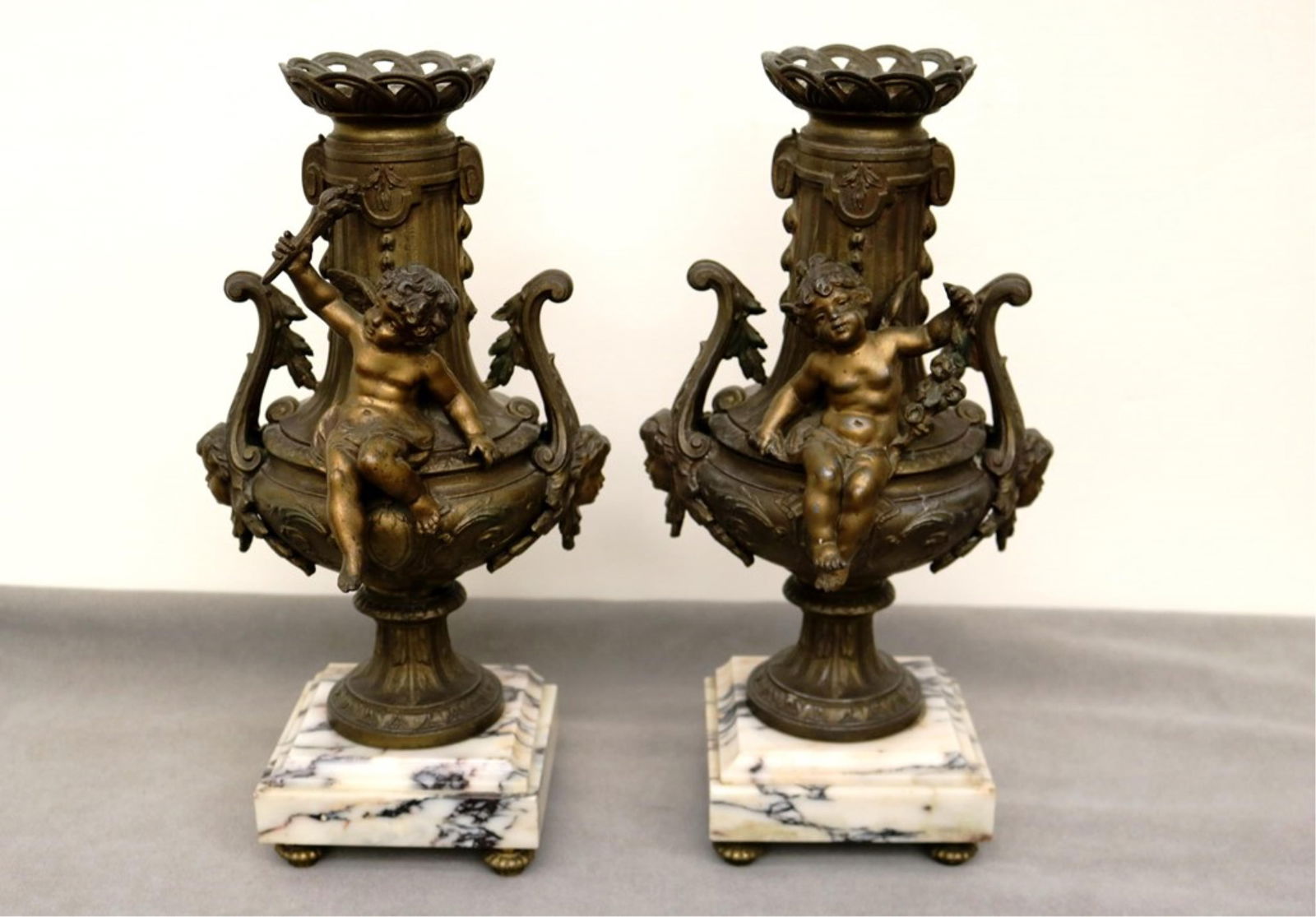 PAIR BRONZED CAST METAL URN-AND-CHERUB FORM LAMP BASES. - Height: 14".. (1 of 7)