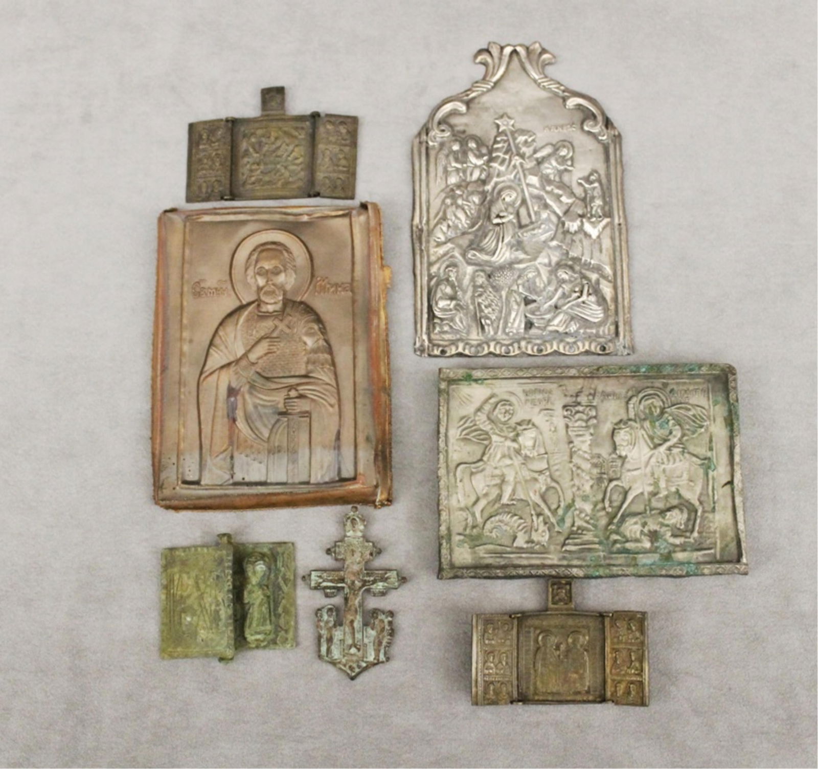 SIX ASSORTED RUSSIAN RELIEF-CAST TRAVELING ICONS AND A CROSS - Largest, 6 7/8 in. x 4 1/4 in.. (1 of 7)
