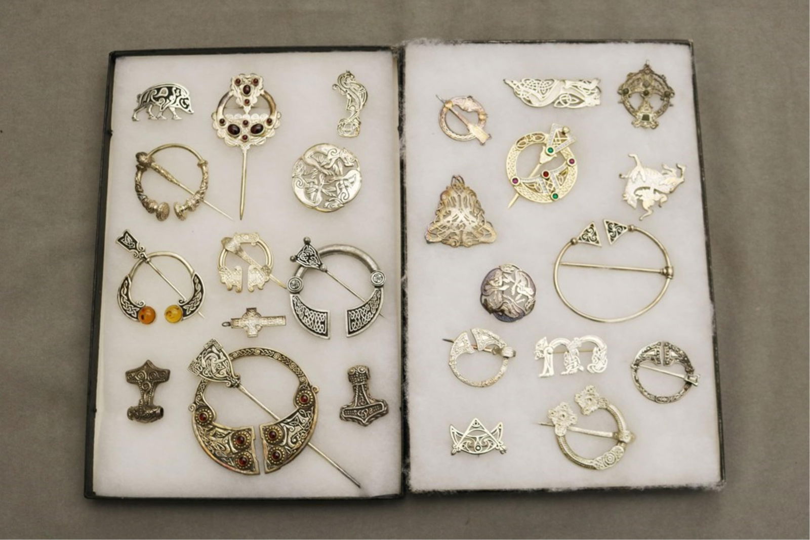 COLLECTION 25 ASSORTED SILVER AND OTHER VESTMENT PINS - .: COLLECTION 25 ASSORTED SILVER AND OTHER VESTMENT PINS Variously of animal form and medallion, some mounted with garnet, amber, and other gemstones. Largest, D: 3 1/8".