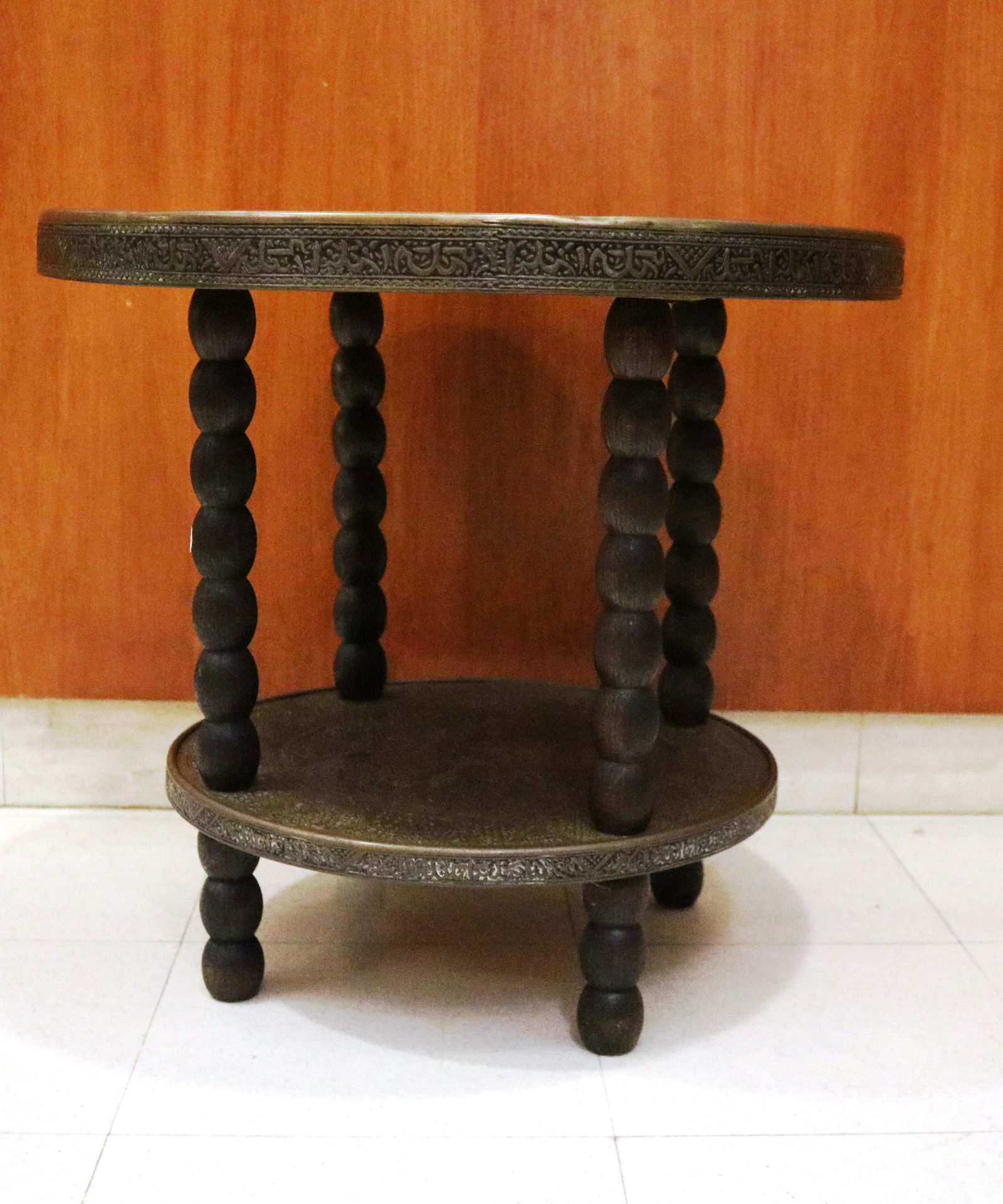 MID-EASTERN CIRCULAR SIDE TABLE WITH BRASS-OVER-WOOD TOP AND MEDIAL SHELF - H: 21 3/4"; Top, D: 23 (1 of 5)