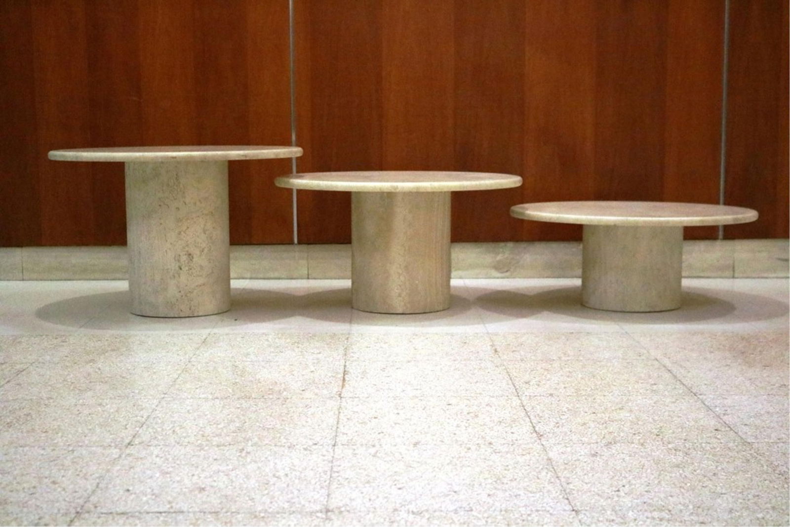 THREE MODERN GRADUATED STRIATED CREAM COLOR STONE "MUSHROOM" TABLES Tallest, H: 15 1/4". Top, D: 23: THREE MODERN GRADUATED STRIATED CREAM COLOR STONE "MUSHROOM" TABLES Tallest, H: 15 1/4". Top, D: 23 1/2".