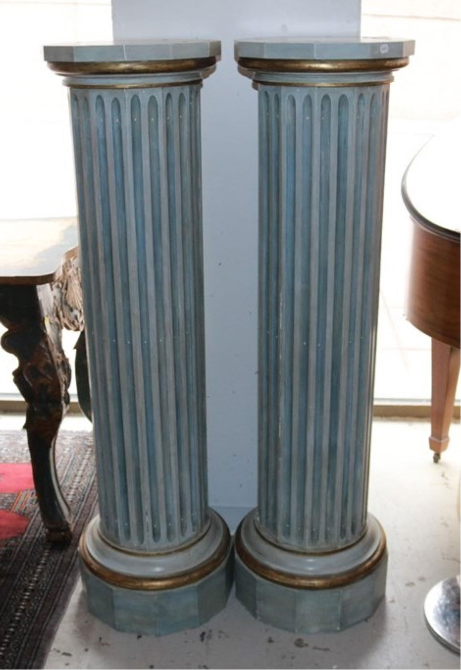 PAIR PALE BLUE-GREEN PAINTED WOODEN, REEDED COLUMN-FORM PEDESTALS. - H: 56 1/4 in. Top, D: 14 in.: PAIR PALE BLUE-GREEN PAINTED WOODEN, REEDED COLUMN-FORM PEDESTALS. Twelve-sided tops and bases; muted gilt accents - H: 56 1/4 in. Top, D: 14 in.