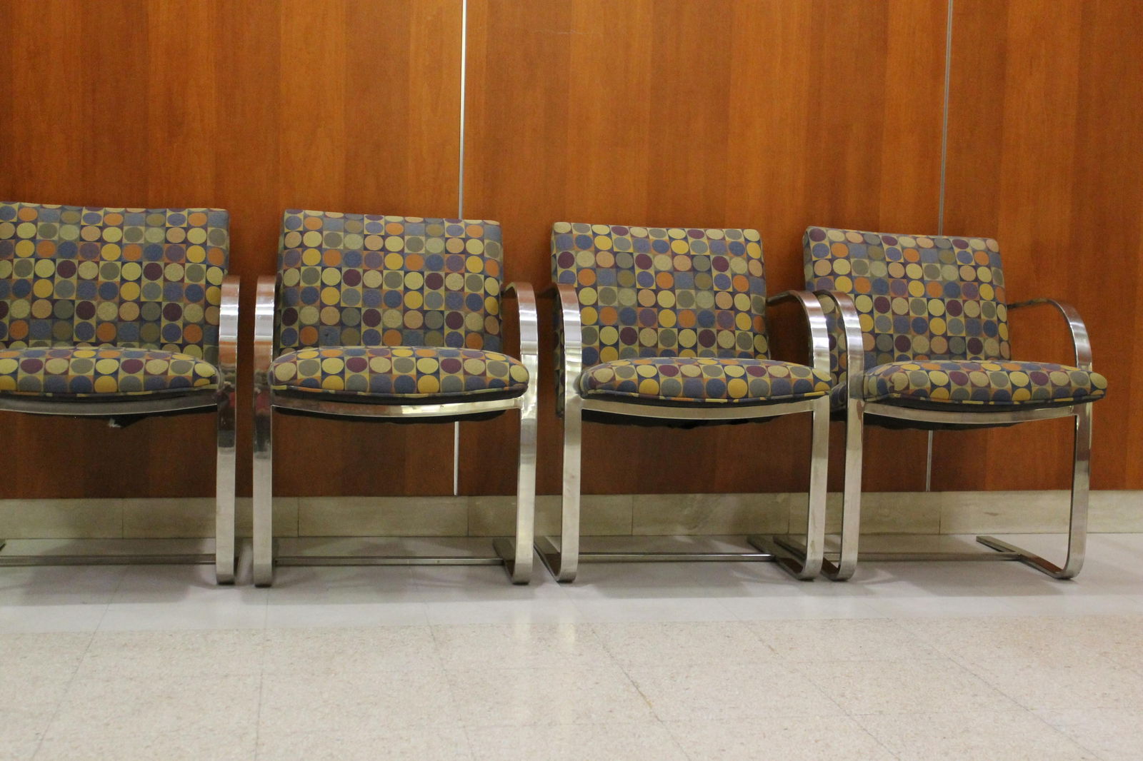 SET OF FOUR MODERN CHROME-FRAME, SPRING BASE OPEN-ARM CHAIRS WITH GEOMETRIC DOT UPHOLSTERY - . (1 of 4)