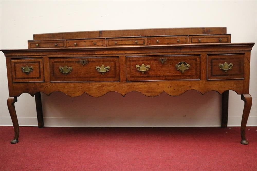 GEORGE II/QUEEN ANNE INLAID OAK WELSH SIDEBOARD. Rectangular top supports five aligned short drawers (1 of 8)