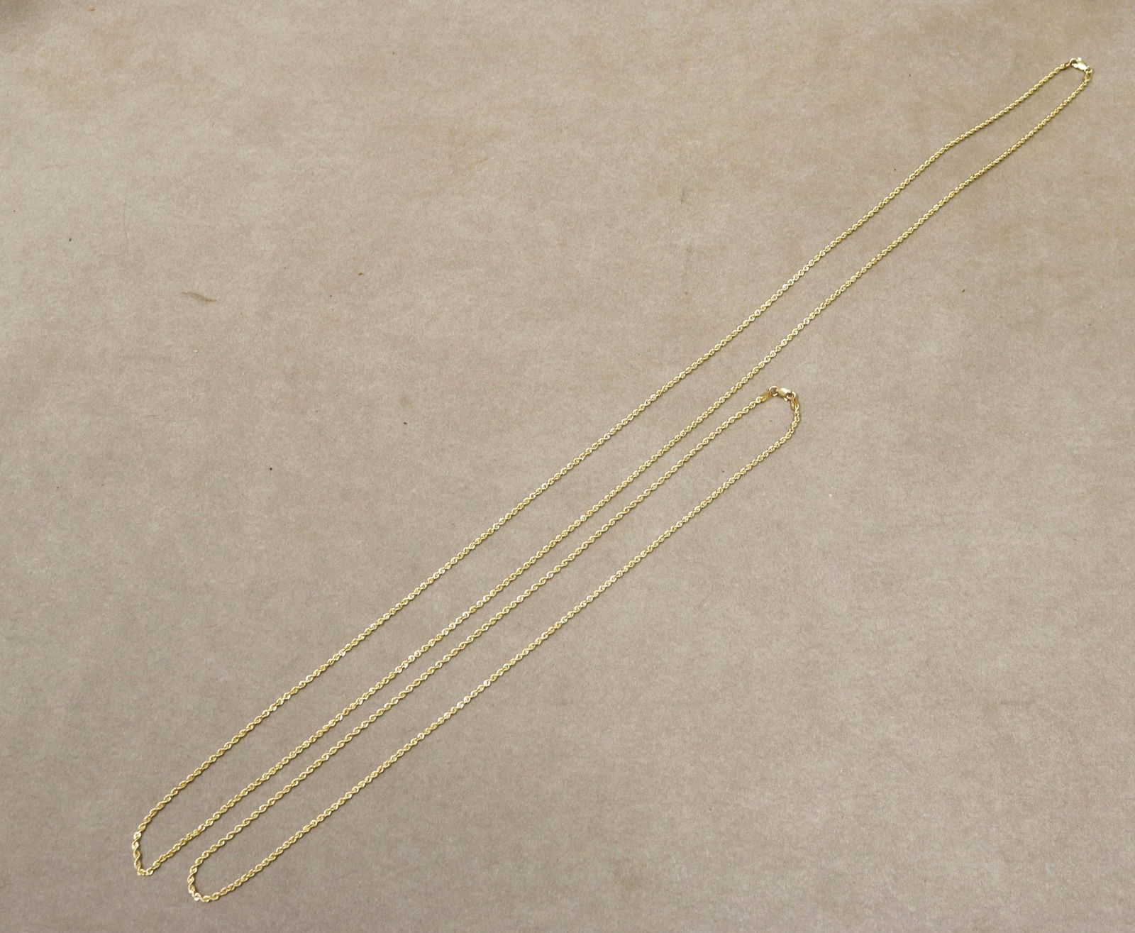TWO PERUVIAN 14K YELLOW GOLD FLEXIBLE-LINK CHAIN NECKLACES - One, L: 22 in.; other, L: 38 in. Wt.: 5 (1 of 4)