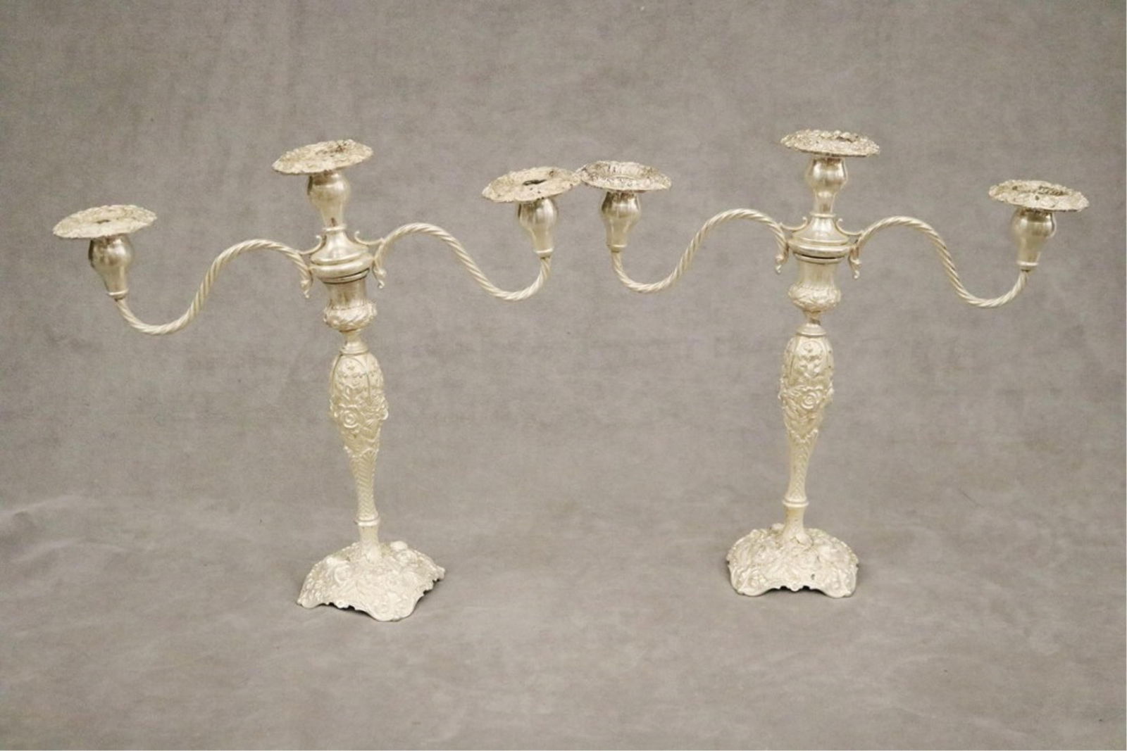 PAIR STIEFF CO. WEIGHTED STERLING SILVER FLORAL REPOUSSE CANDLESTICKS WITH SEPARATE THREE-LIGHT (1 of 10)