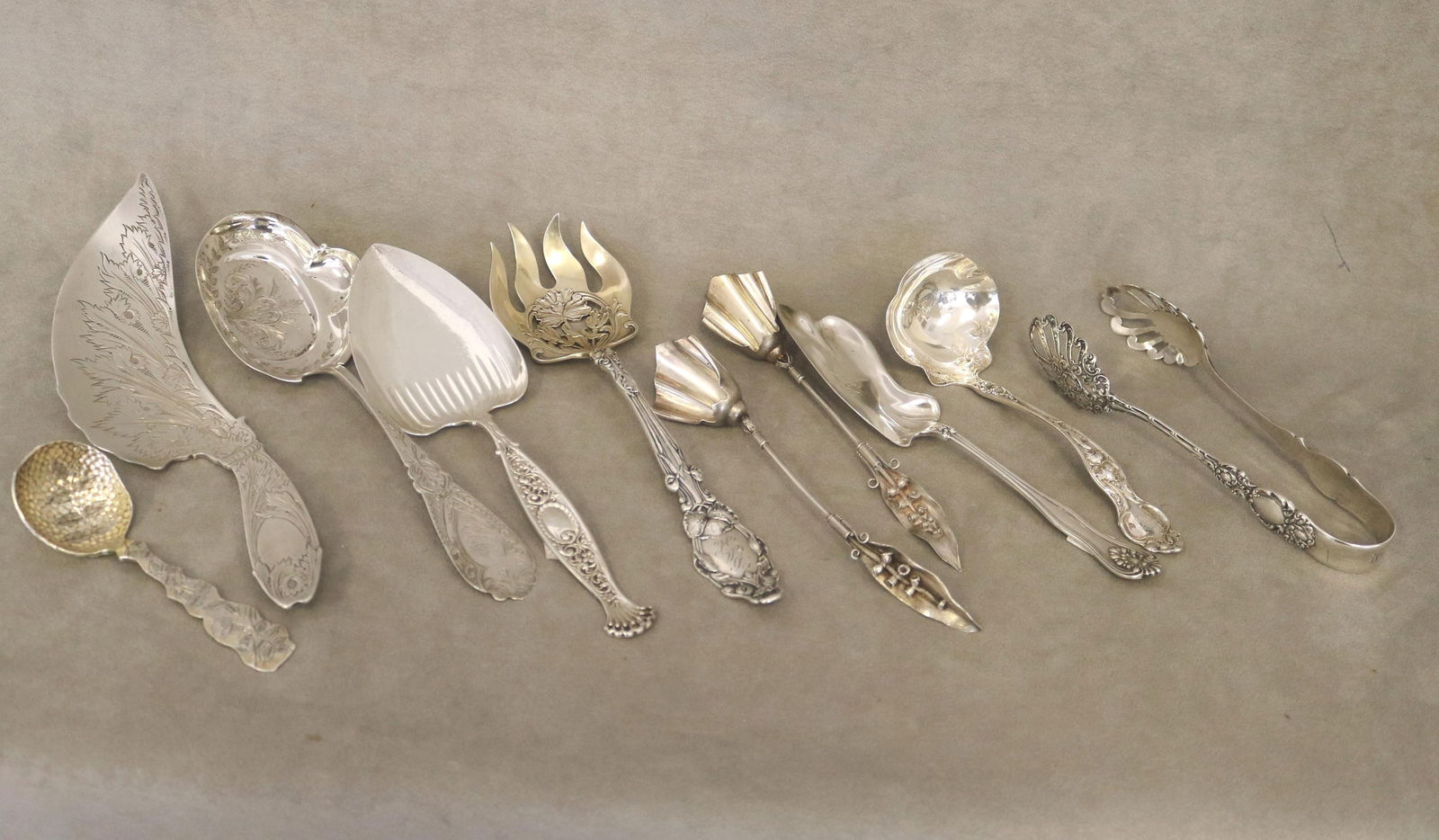 TEN ASSORTED SILVER SERVING PIECES late 19th-early 20th century - Longest, L: 10 5/8 in. Wt. 25 troy (1 of 20)