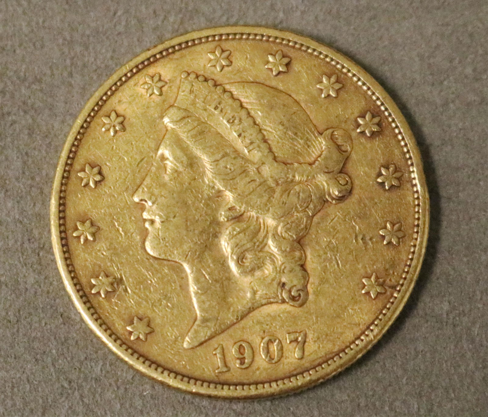 U.S. TWENTY-DOLLAR GOLD COIN DATED 1907 - . (1 of 2)