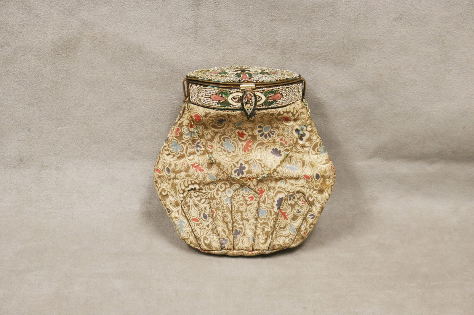 VINTAGE EVENING BAG WITH BEADING AND ENAMELED ACCENTS - .: VINTAGE EVENING BAG WITH BEADING AND ENAMELED ACCENTS Beaded lozenge-shape top and clasp with enameled floral accents; all-over whimsical pattern of blue and rose blossoms on cream ground with