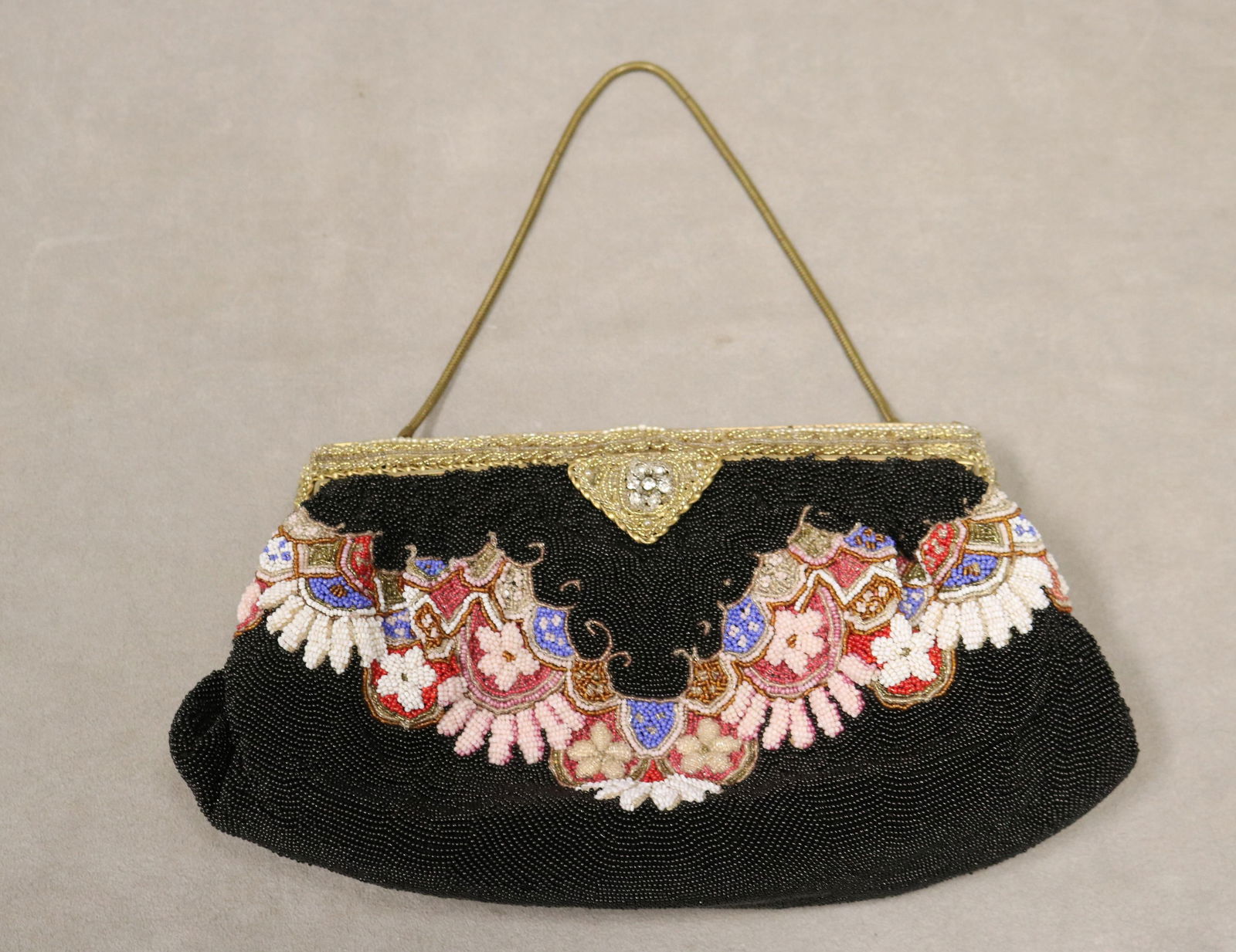 VINTAGE FLORAL BEADED EVENING BAG - .: VINTAGE FLORAL BEADED EVENING BAG All-over beaded white and pale pink floral blossoms arranged on rose and blue scalloped pattern with white, copper and gold-tone accents, all on black ground. 