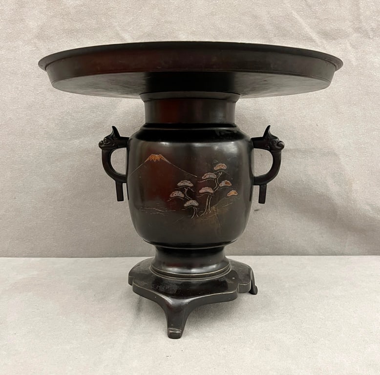 JAPANESE BRONZE IKEBANA VASE. Meiji period.: JAPANESE BRONZE IKEBANA VASE. Meiji period. Typical form with relief-cast decoration and two handles