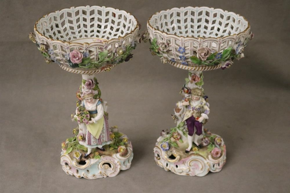 PAIR DRESDEN (CARL THIEME) POLYCHROMED PORCELAIN FIGURAL COMPOTES. Applied fully sculpted blossom: PAIR DRESDEN (CARL THIEME) POLYCHROMED PORCELAIN FIGURAL COMPOTES. Applied fully sculpted blossom decoration; floral sprays - Compote, H: 10 3/8 in.
