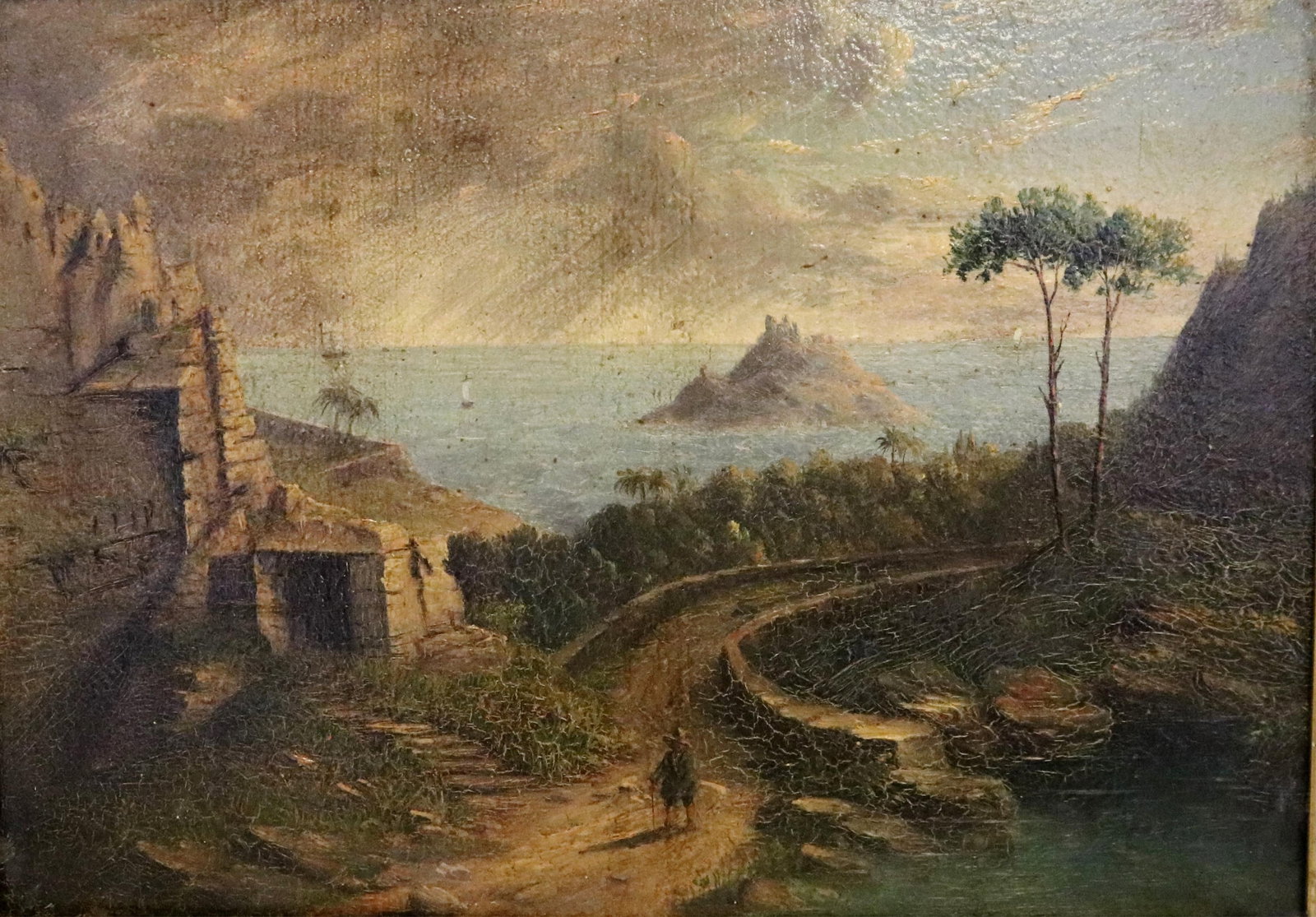 ITALIAN SCHOOL , (19th Century). View Near Syracuse, Sicily (Italy), Oil on board., 9 x 13 inches;: ITALIAN SCHOOL19th CenturyView Near Syracuse, Sicily (Italy)Oil on board.Unsigned. Painting captures a lone traveler with a walking stick and the stone ruins of a fortification or watchtower on the hi