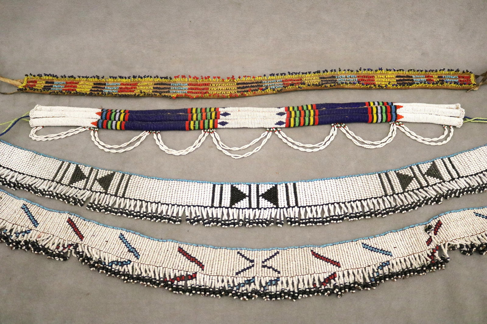 SOUTH AFRICAN ZULU PEOPLE BEADED UMUTSHA BELTS - .: SOUTH AFRICAN ZULU PEOPLE BEADED UMUTSHA BELTS These traditional Zulu beaded belts, known as umutsha, are vibrant accessories from South Africa that showcase the exceptional craftsmanship and intricat