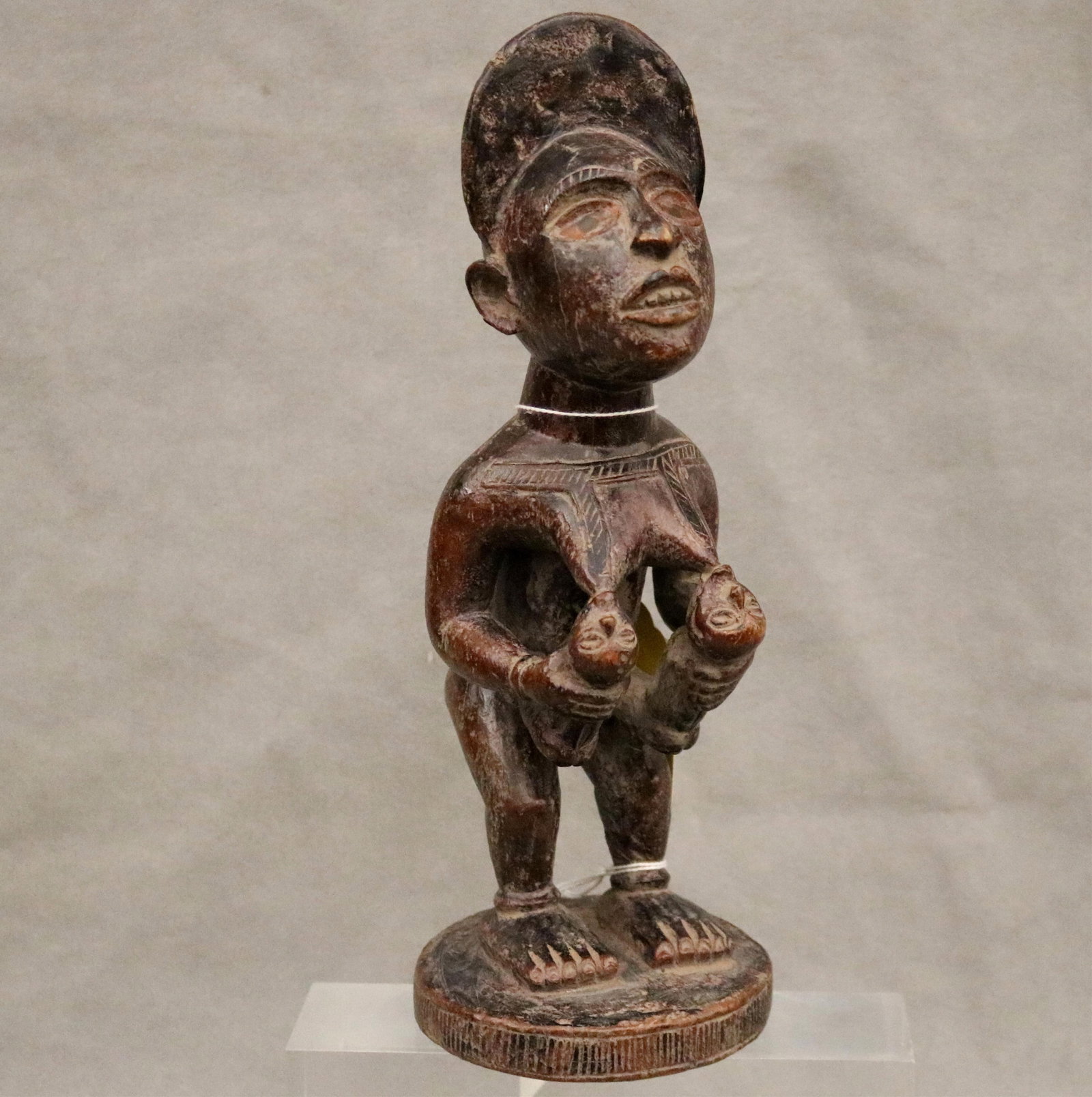 CONGOLESE PFEMBA MATERNITY FIGURINE Democratic Republic of the Congo - Height: 11.5 inches.: CONGOLESE PFEMBA MATERNITY FIGURINE Democratic Republic of the Congo This patinated Kongo pfemba (maternity figure) from the Democratic Republic of the Congo is a profound representation of the "mothe