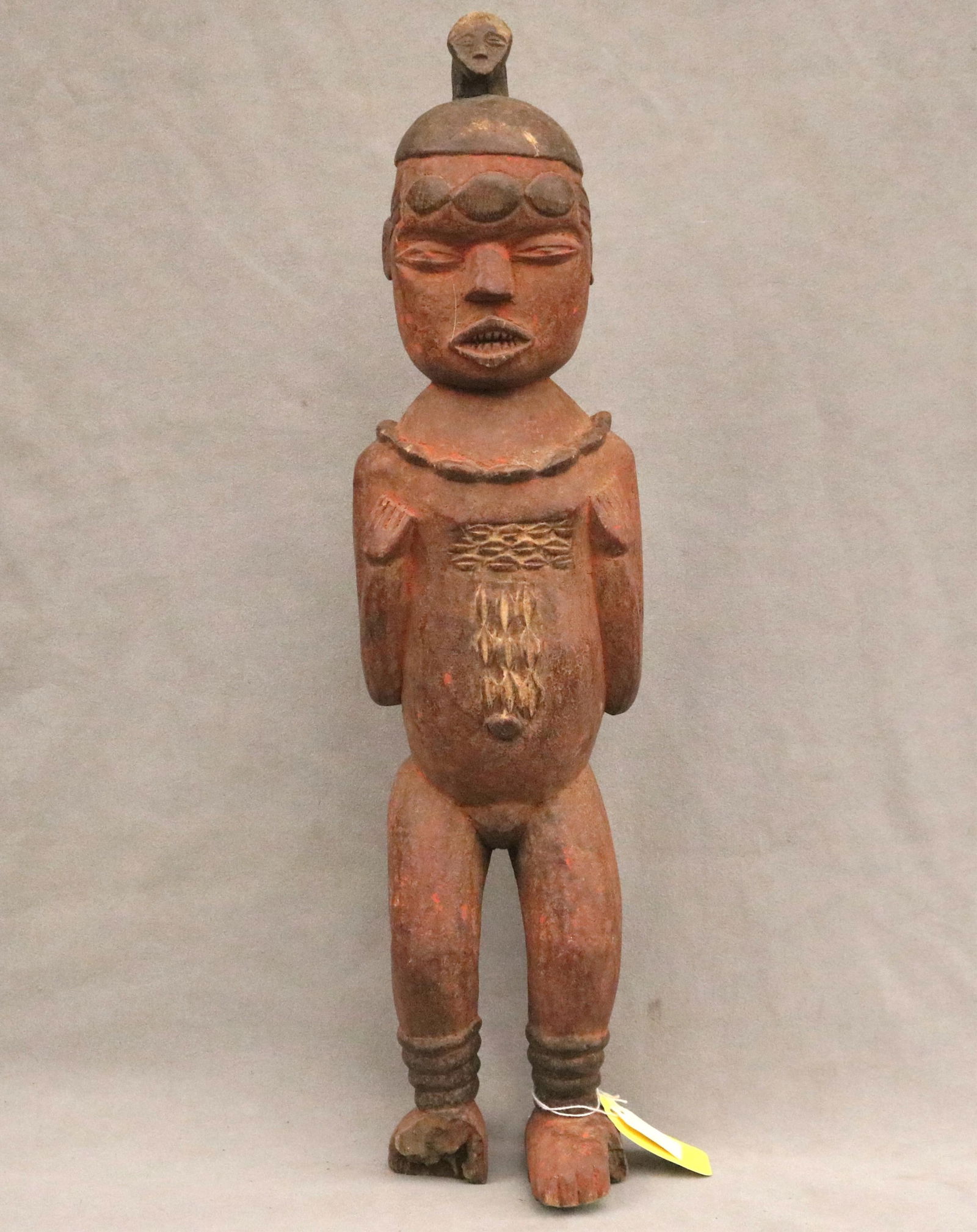 CONGOLESE KUYU KEBE-KEBE SOCIETY STATUE - Height: 22 inches.: CONGOLESE KUYU KEBE-KEBE SOCIETY STATUE This Kuyu statue from the Republic of the Congo is a vibrant example of the region's unique anthropomorphic sculptural style, often associated with the secret K