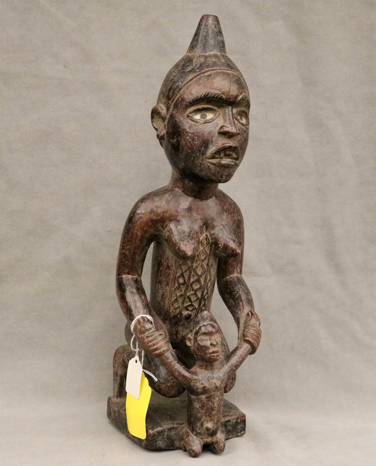 CONGOLESE KONGO MOTHER AND CHILD PHEMBA STATUE - Height: 18 inches.: CONGOLESE KONGO MOTHER AND CHILD PHEMBA STATUE This Kongo mother and child sculpture (also known as a phemba or mpemba) is a profound icon of Central African art from the Democratic Republic of the Co