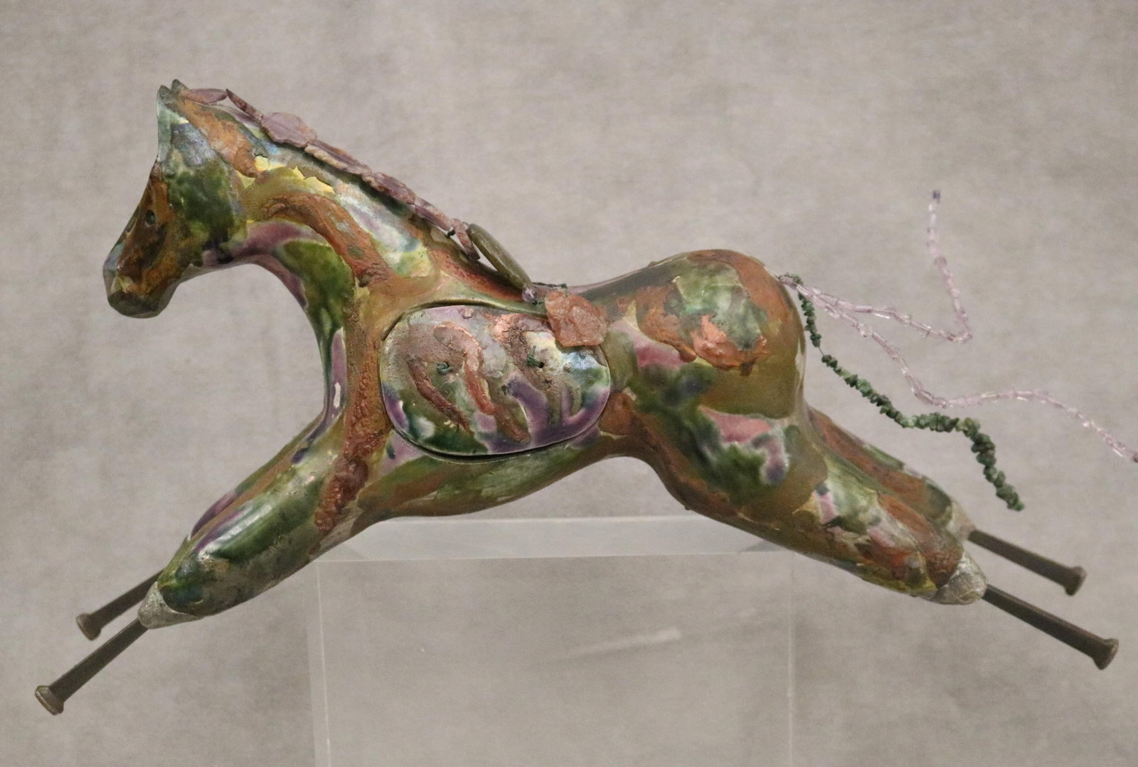 SHEENA CAMERON, (American 20th Century). Messenger Horse, fired clay using the raku method, Length:: SHEENA CAMERONAmerican, 20th CenturyMessenger Horsefired clay using the raku methodSheena Cameron’s "Messenger Horses" are sturdy, contemplative sculptures crafted from stoneware and fired using the