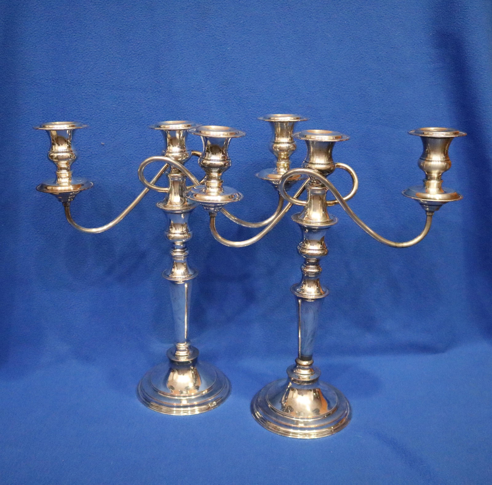 PAIR SILVER-ON-COPPER THREE-LIGHT CANDELABRA CONVERTIBLE TO SINGLE CANDLESTICKS - H: 15 1/4 in.. (1 of 9)