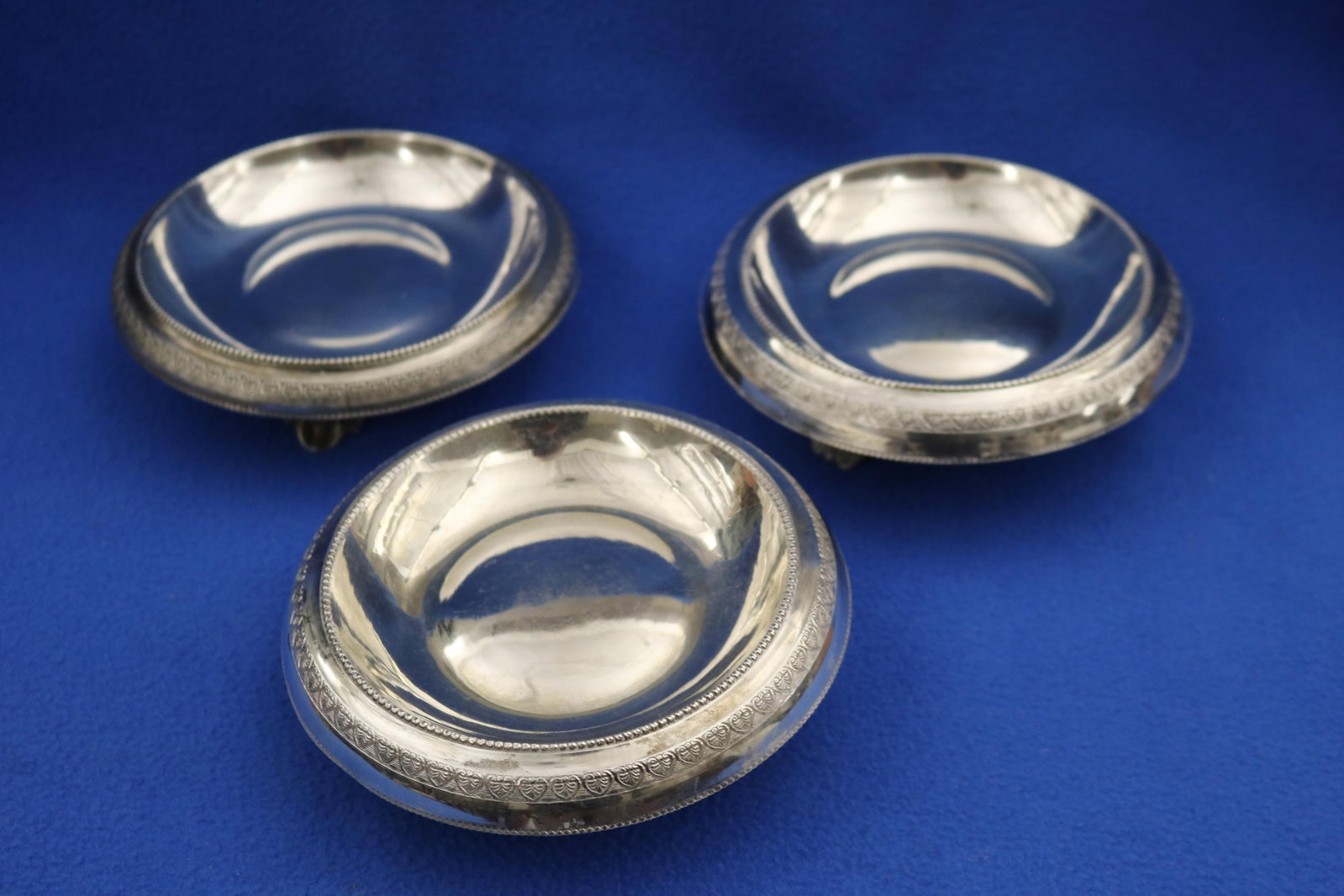 THREE CONTINENTAL SILVER (900-FINE) WINE BOTTLE COASTERS 19th century - D: 5 3/8 in. Wt. 18 troy (1 of 14)