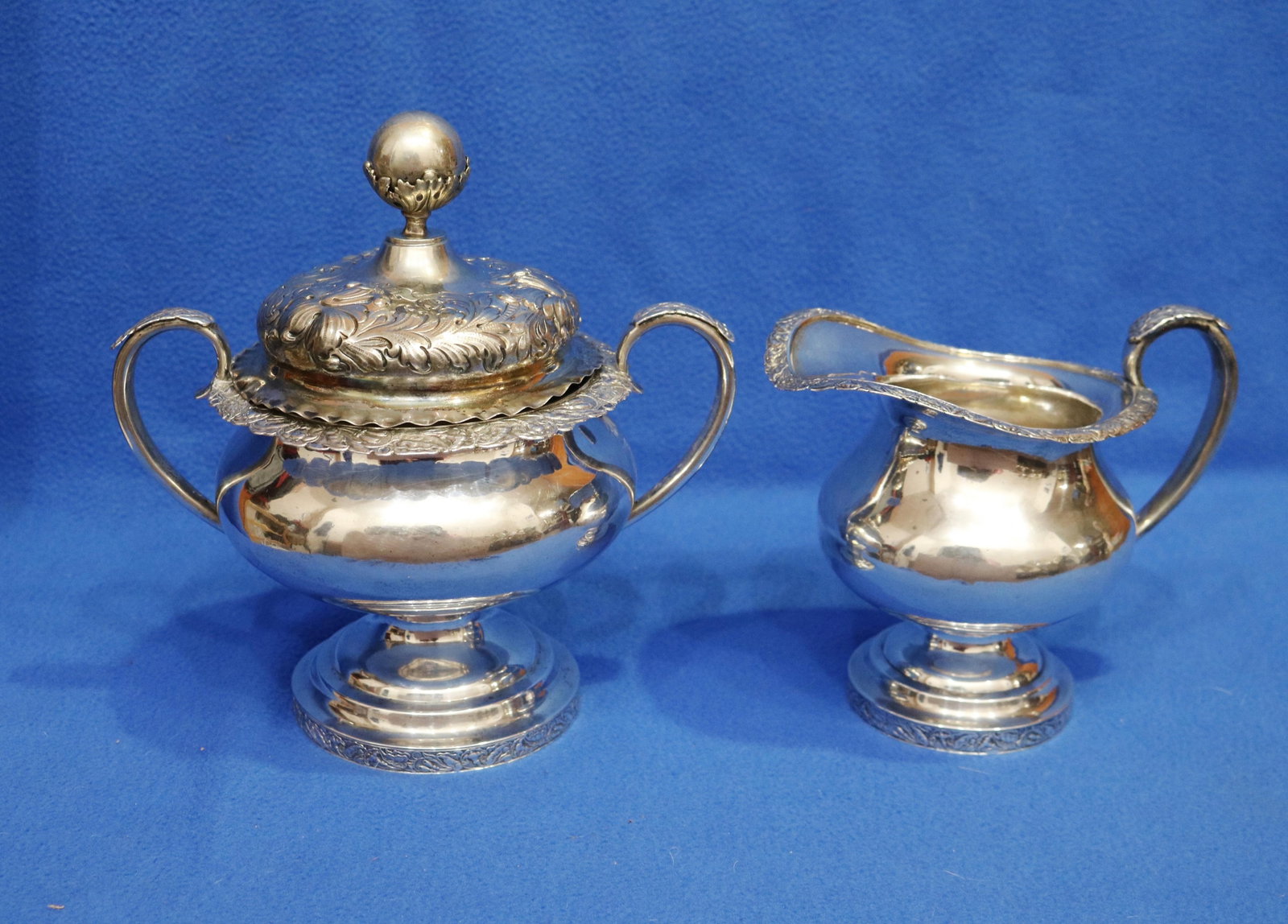 AMERICAN EMPIRE COIN SILVER CREAMER AND TWO-HANDLE SUGAR BOWL BY DAVIS PALMER & CO., BOSTON, MA 19th: AMERICAN EMPIRE COIN SILVER CREAMER AND TWO-HANDLE SUGAR BOWL BY DAVIS PALMER & CO., BOSTON, MA 19th century Pedestal bases; bands of low relief floral and leaf decoration on stippled ground; sugar