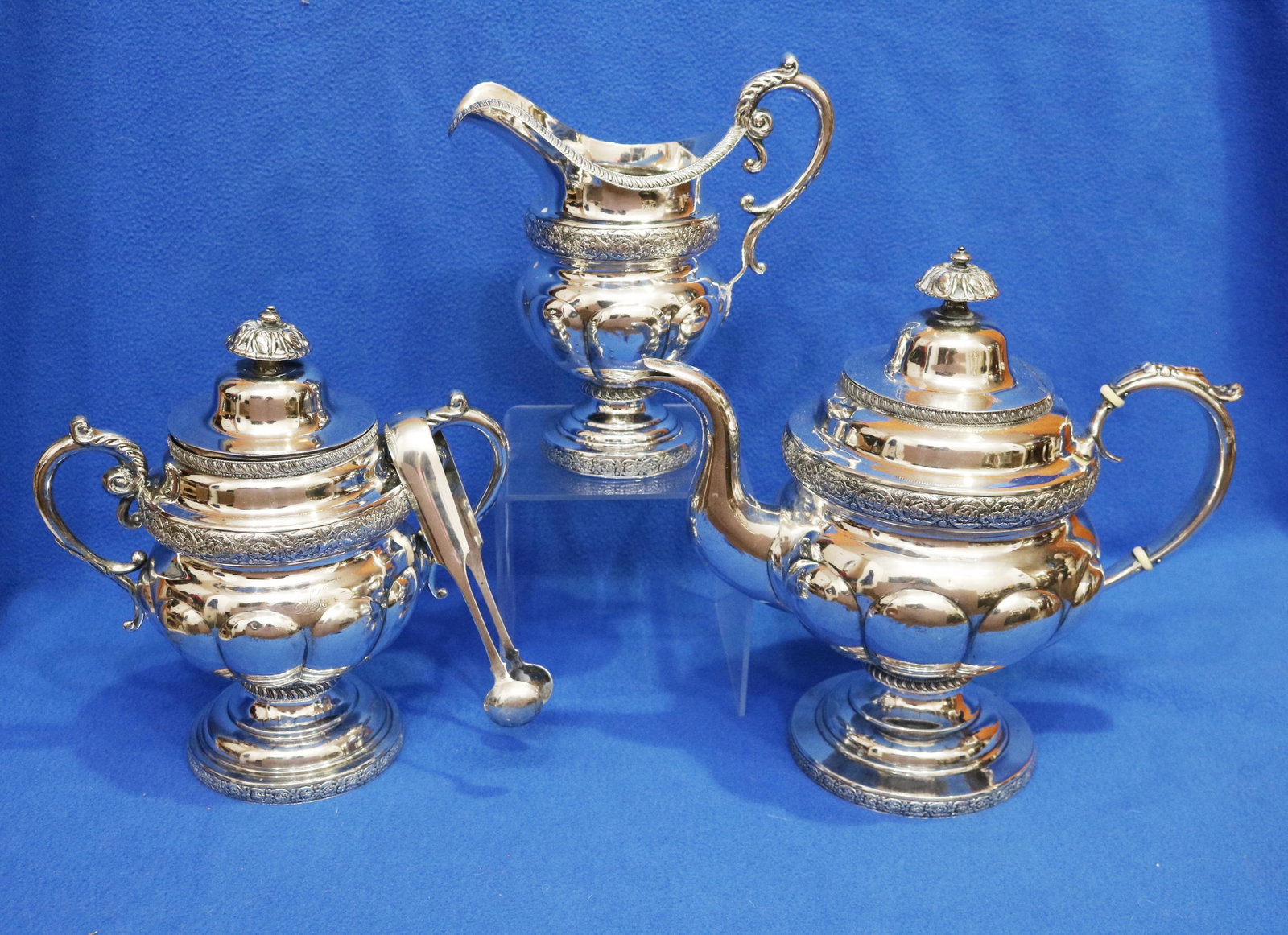 THREE-PIECE AMERICAN EMPIRE COIN SILVER TEA SERVICE Maker unknown (unmarked) - Teapot, H: 10 1/2 in. (1 of 20)