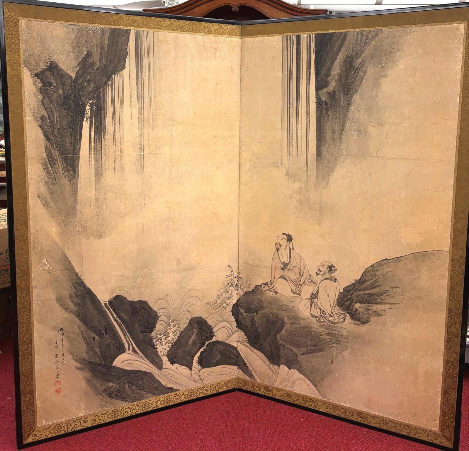 JAPANESE TWO-PANEL SCREEN, SAGES CONTEMPLATING A WATERFALL, SIGNED AND SEALED Meiji Period - Each: JAPANESE TWO-PANEL SCREEN, SAGES CONTEMPLATING A WATERFALL, SIGNED AND SEALED Meiji Period Ink on paper screen depicting two seated sages gazing upward beside cascading waterfall and rocky landscape,