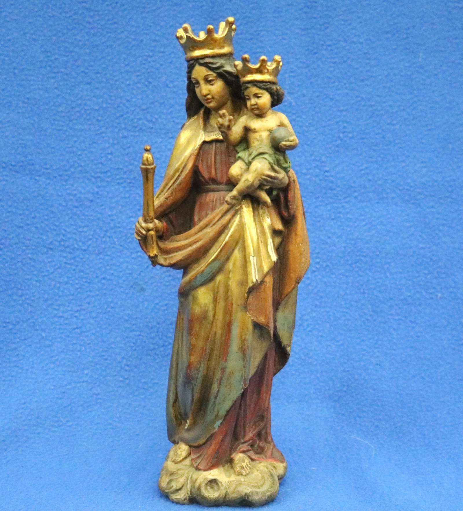 CONTINENTAL FIGURINE DEPICTING SANCTA MARIA AUXILIUM CHRISTIANORUM - Height: 10.25 inches.: CONTINENTAL FIGURINE DEPICTING SANCTA MARIA AUXILIUM CHRISTIANORUM Hand-painted, carved and gilded figurine depicting Mary Help of Christians (also known as Maria Auxiliatrix or Regina Coeli), a
