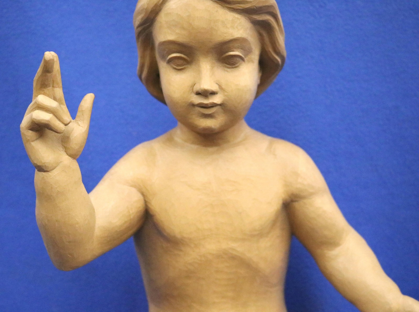 CONTINENTAL HAND-CARVED WOODEN FIGURE OF CHRIST CHILD ATOP A TASSELED CUSHION. - height: 18 inches. (1 of 16)