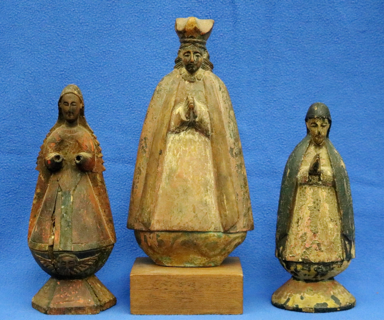 THREE WOODEN SANTO FIGURINES, EACH DEPICTING THE VIRGIN MARY - Height (approx): 9.5 inches. (1 of 17)