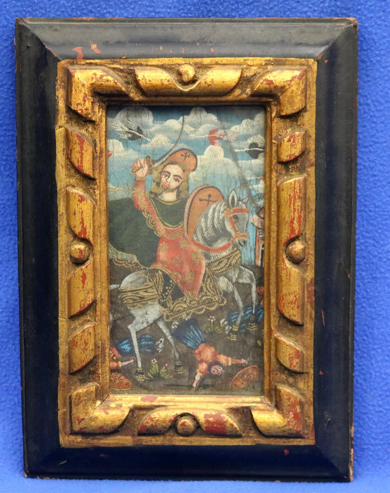 CUZCO-STYLE PAINTING DEPICTING SAINT JAMES THE GREATER - Frame: 11 x 8 inches.: CUZCO-STYLE PAINTING DEPICTING SAINT JAMES THE GREATER Cuzco-style oil on canvas traditional devotional painting depicting Saint James the Greater in his militant iconographic form as Santiago Matamor