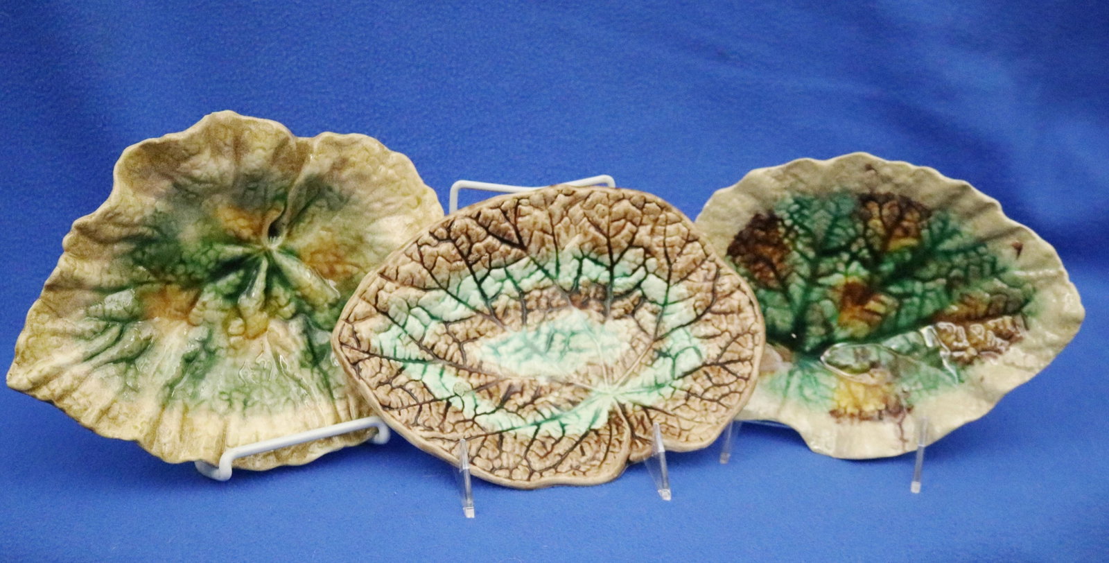 GROUP NINE GREEN AND BROWN GLAZED MAJOLICA LEAF-SHAPE PLATES WITH TWO SIMILAR SERPENTINE CIRCULAR (1 of 6)