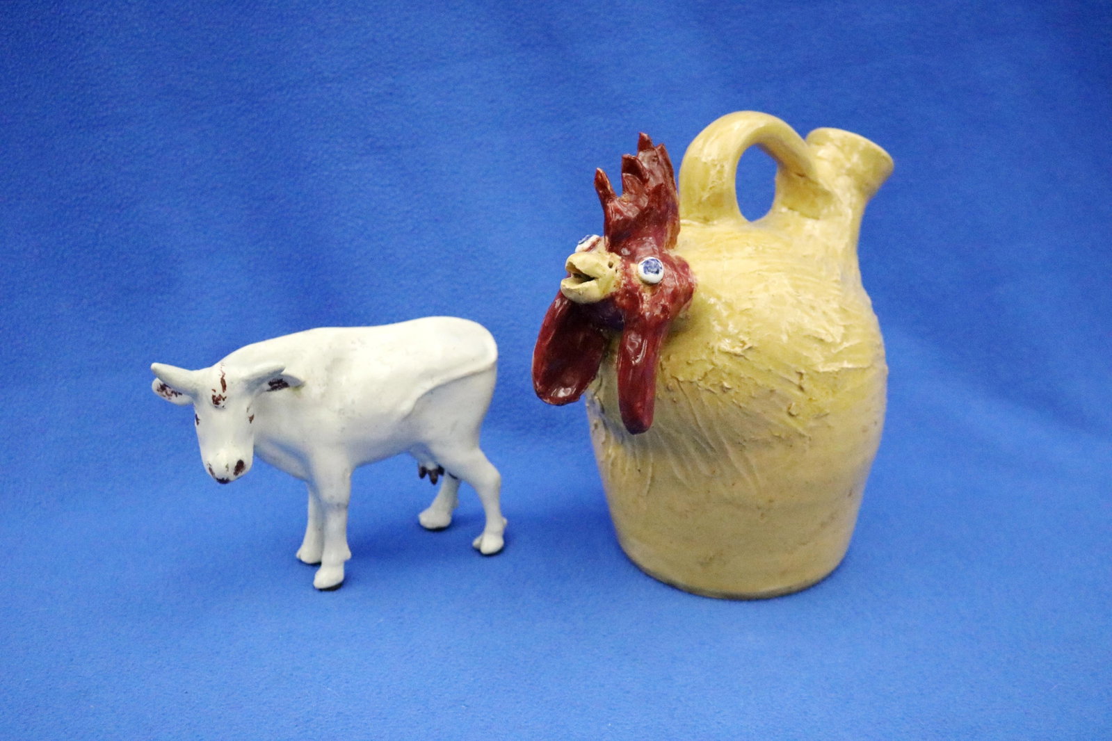 SIGNED PRIMITIVE POLYCHROMED POTTERY JUG MODELED AS ROOSTER BY ALABAMA FOLK ARTIST JERRY BROWN, WITH (1 of 8)