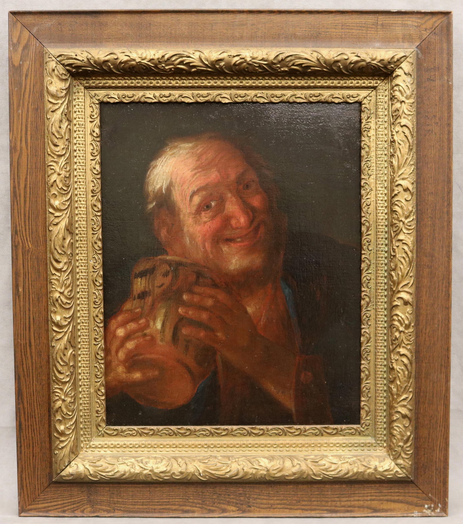 DUTCH SCHOOL (18th / 19th Century). The Merry Drinker, Oil on canvas., 20 x 16 inches; frame: 30 x: DUTCH SCHOOL 18th / 19th Century The Merry Drinker Oil on canvas. A ruddy-faced, white-haired old man grins broadly as he cradles a ceramic tankard or jug in both hands, clearly savoring the prospect 