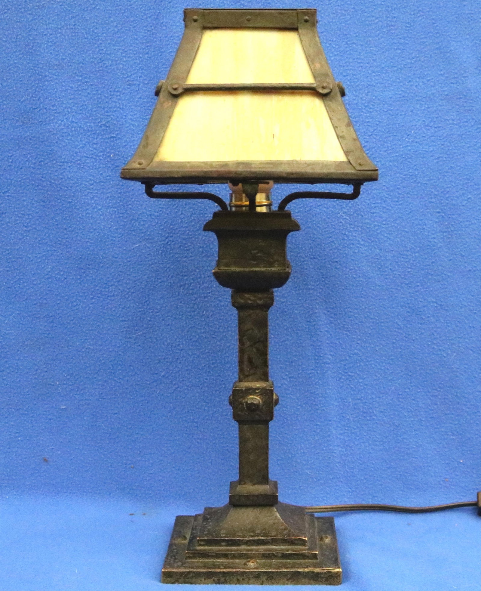 MISSION OR ARTS & CRAFTS STYLE IRON TABLE LAMP early 20th century - Height: 16 1/2 in..: MISSION OR ARTS & CRAFTS STYLE IRON TABLE LAMP early 20th century Heavy metal base supporting square paneled shade. Height: 16 1/2 in.