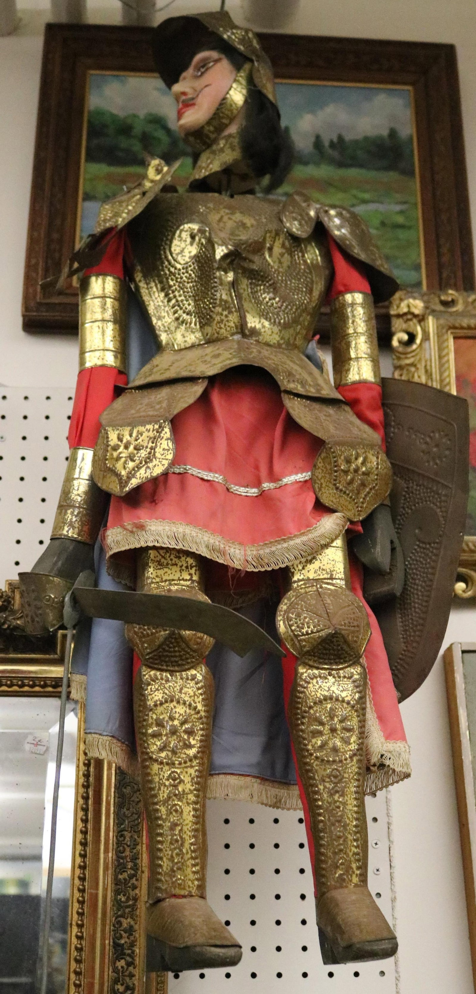 ITALIAN HAND-CARVED MEDIEVAL KNIGHT PUPPET OR MARIONETTE - H: 37 in. With hook, app. 49 in.: ITALIAN HAND-CARVED MEDIEVAL KNIGHT PUPPET OR MARIONETTE Dressed in full metal body armor, with metal shield and sword. Hand-painted face; fully-jointed body H: 37 in. With hook, app. 49 in