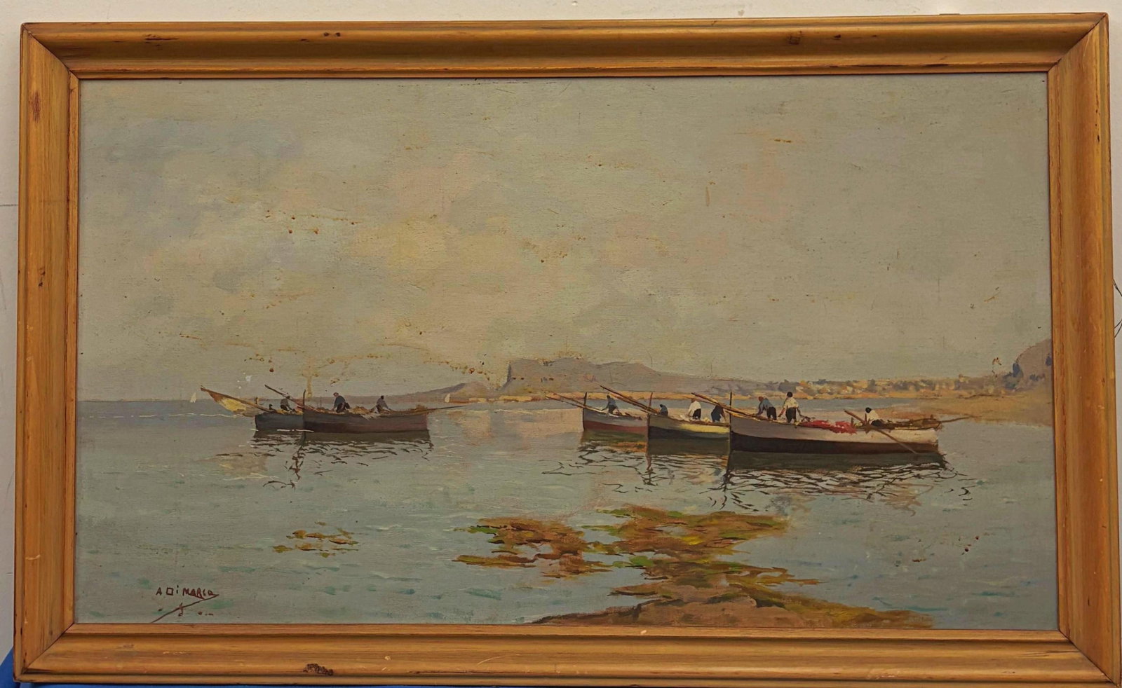 ITALIAN SCHOOL (20th century). Fishing Boats in a Mediterranean Harbor, Oil on board, 20 x 34 inches: ITALIAN SCHOOL 20th century Fishing Boats in a Mediterranean Harbor Oil on board Painting of a Mediterranean harbor scene with several small wooden fishing boats floating on calm waters in the soft li