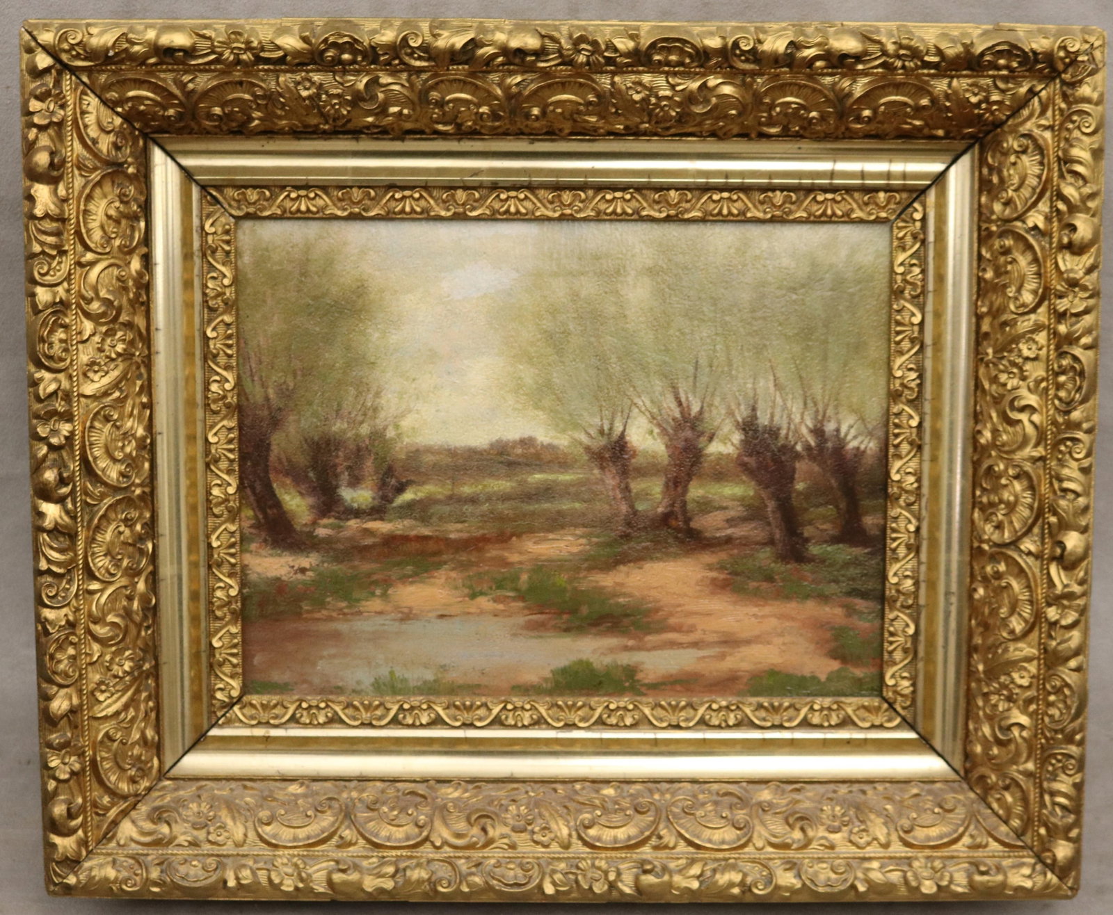 CONTINENTAL SCHOOL (19th century). Pollarded Willows by the Pond, Oil on canvas-board: CONTINENTAL SCHOOL 19th century Pollarded Willows by the Pond Oil on canvas-board Oil painting depicts a row of gnarled pollarded willow trees standing along a muddy country path beside a shallow pond