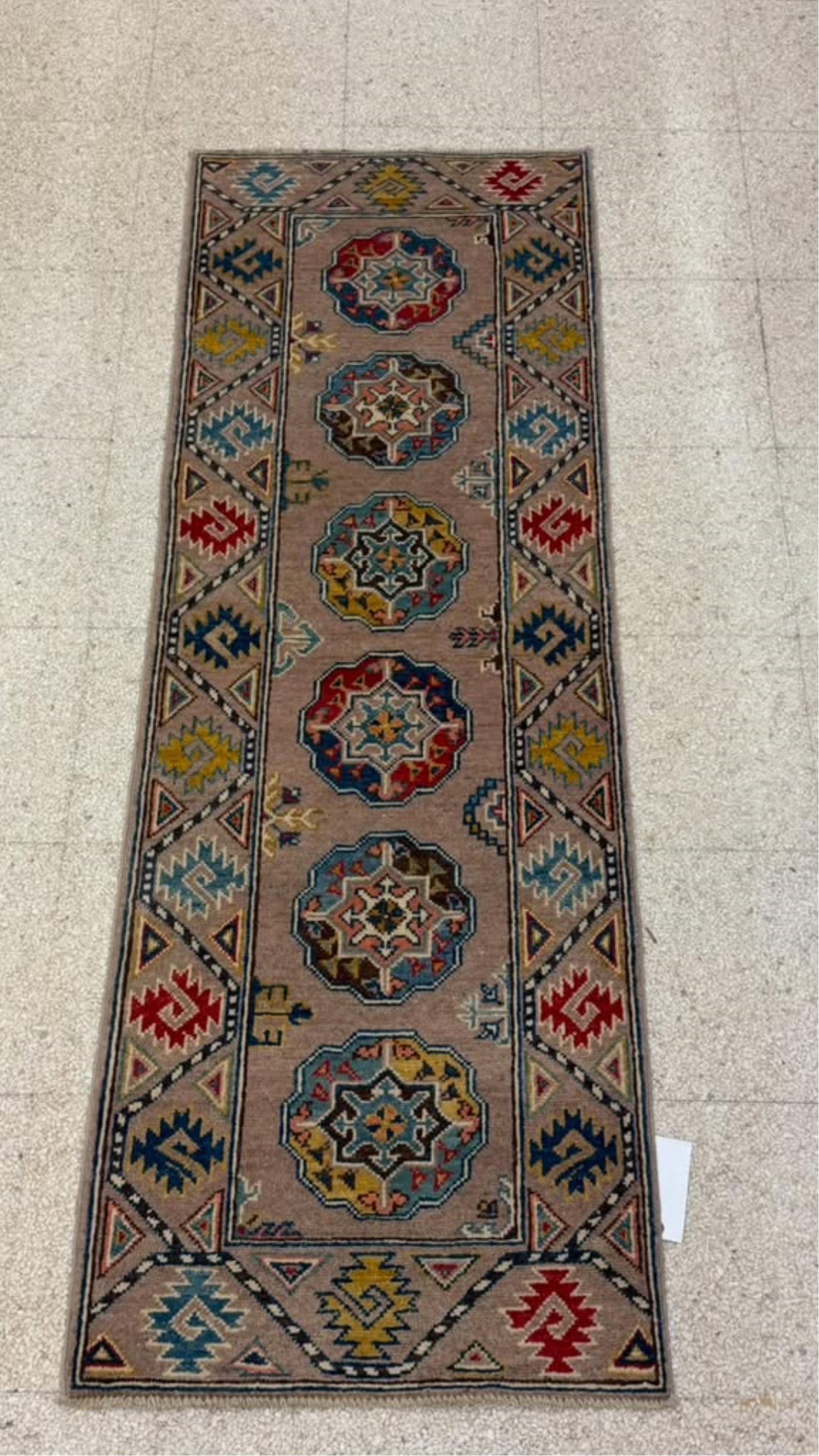 KAZAK RUNNER - App. 2 ft. x 5 ft.10 in..: KAZAK RUNNER Tan ground with red, blue and yellow medallions and accents. App. 2 ft. x 5 ft.10 in.