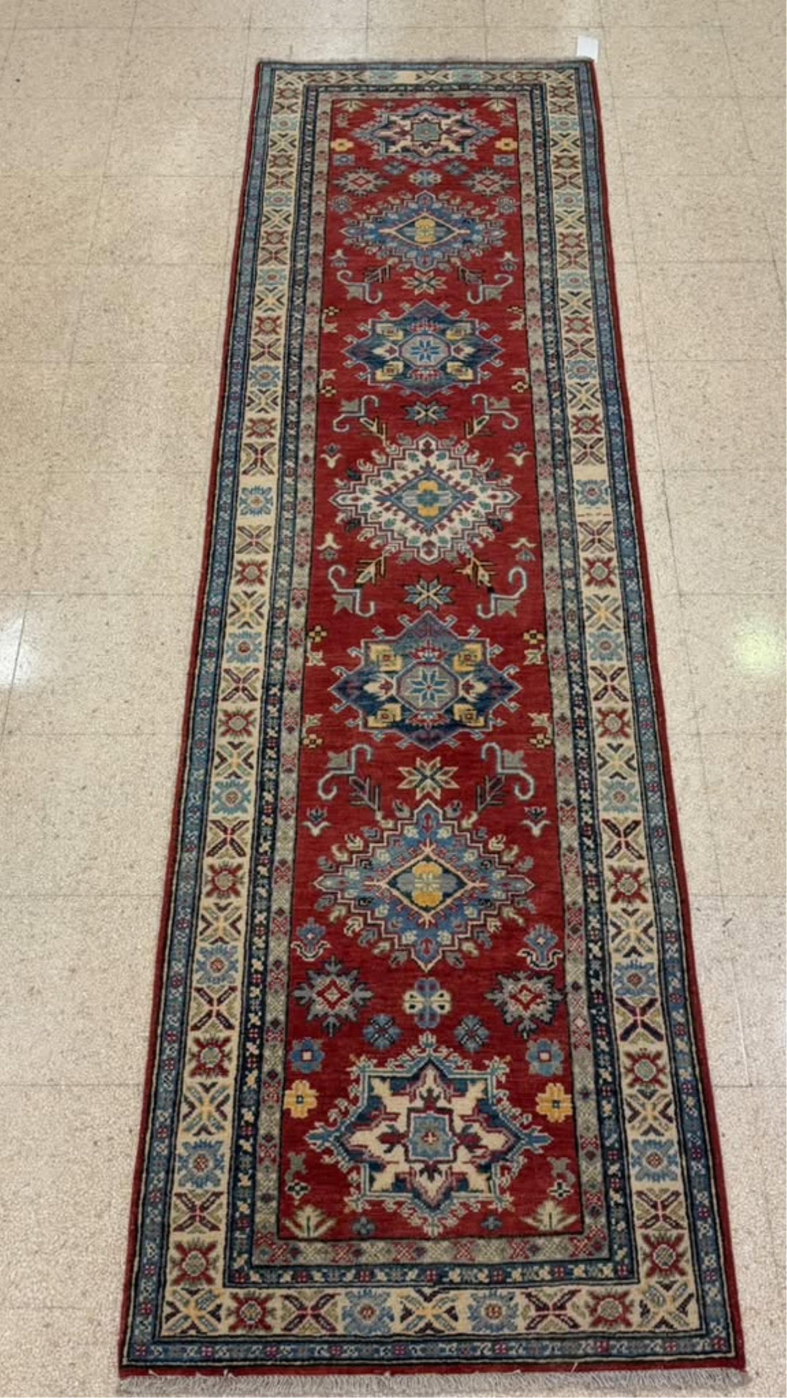 KAZAK RUNNER - App. 2 ft. 9 in. x 9 ft. 8 in..: KAZAK RUNNER Rust ground with gray-blue accents App. 2 ft. 9 in. x 9 ft. 8 in.