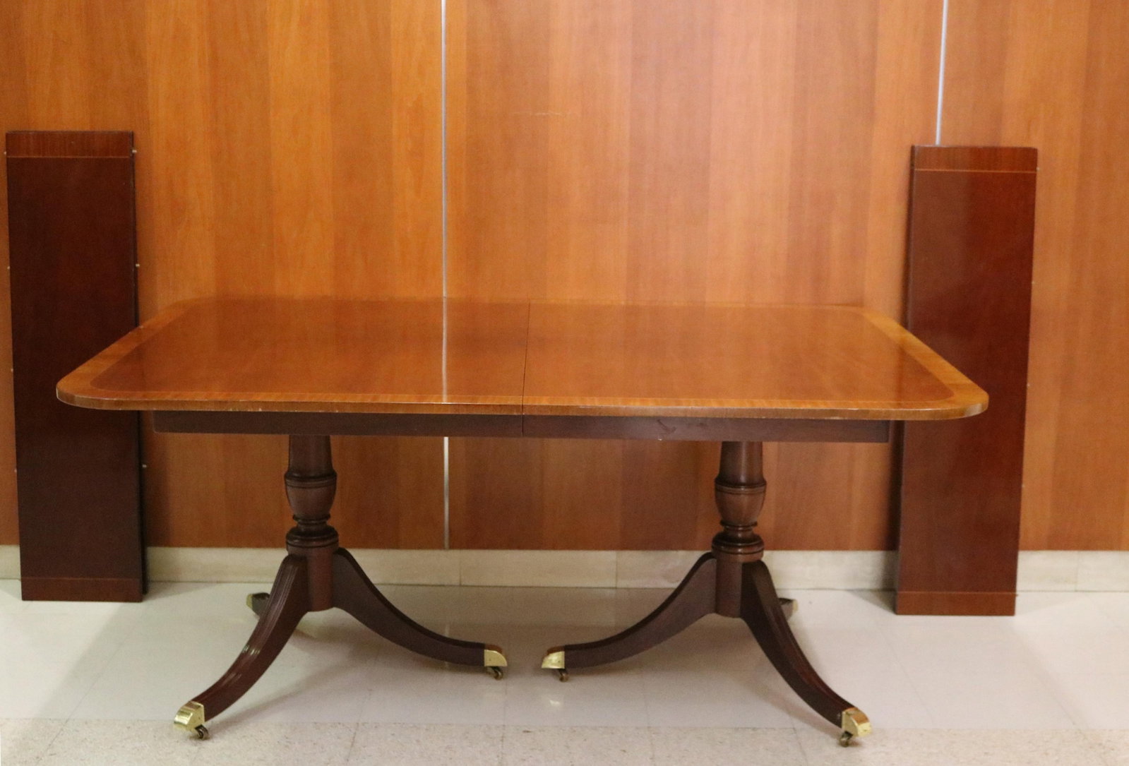 GEORGIAN-STYLE INLAID MAHOGANY DOUBLE-PEDESTAL DINING TABLE WITH RACETRACK BORDER AND FOUR LEAVES. - (1 of 11)