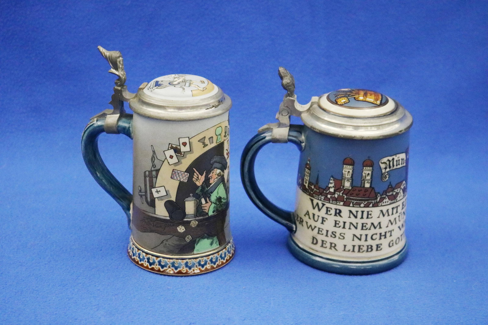 TWO CASTLE METTLACH POLYCHROMED DECORATED HINGED-COVER BEER STEINS - Taller, H: 7 in.. (1 of 8)