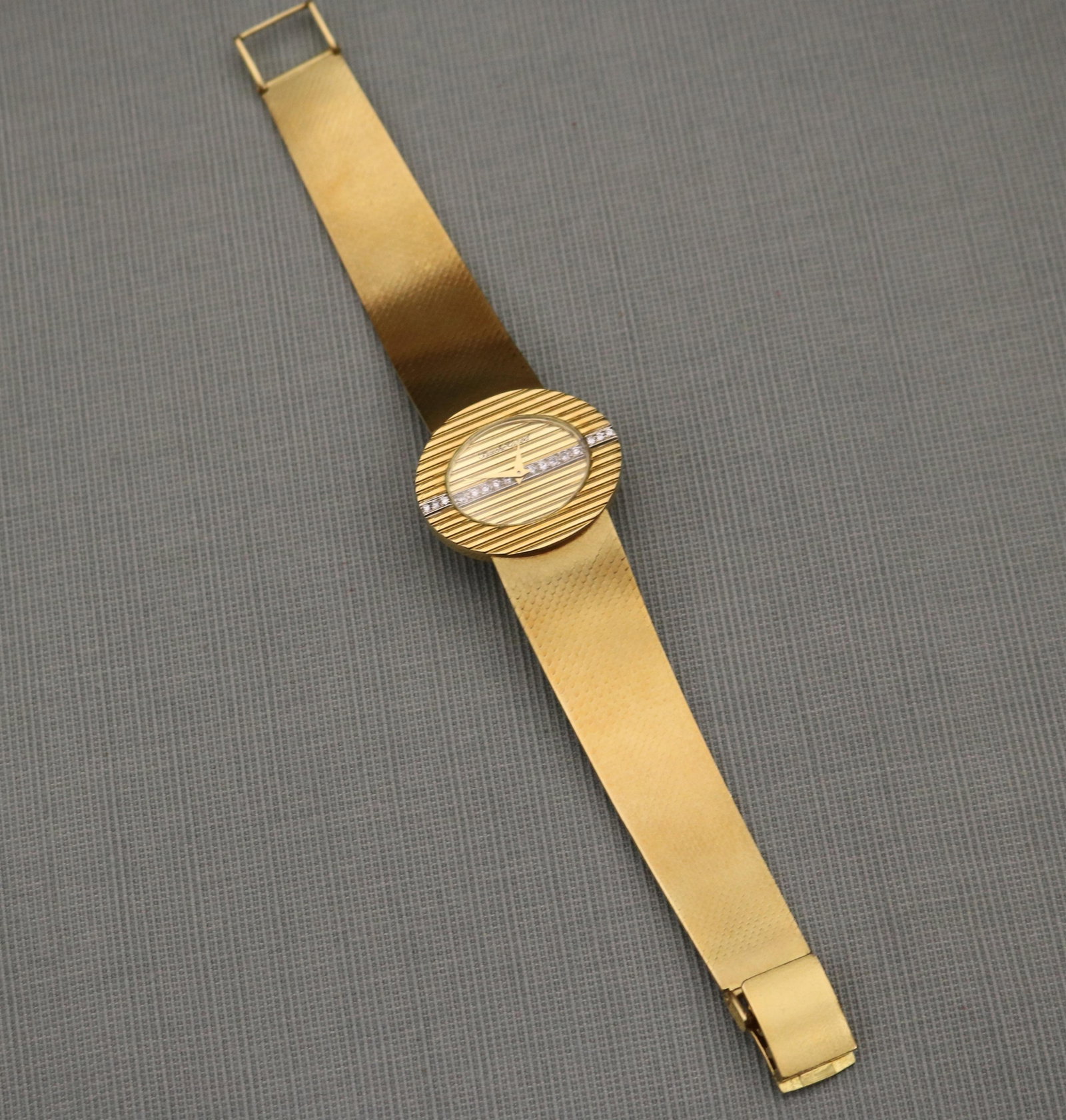 LADY'S BUECHE- GIROD 18K (750) YELLOW GOLD AND DIAMOND WATCH - L: 7 1/4 in. W: 1 3/16 in., at case. (1 of 18)