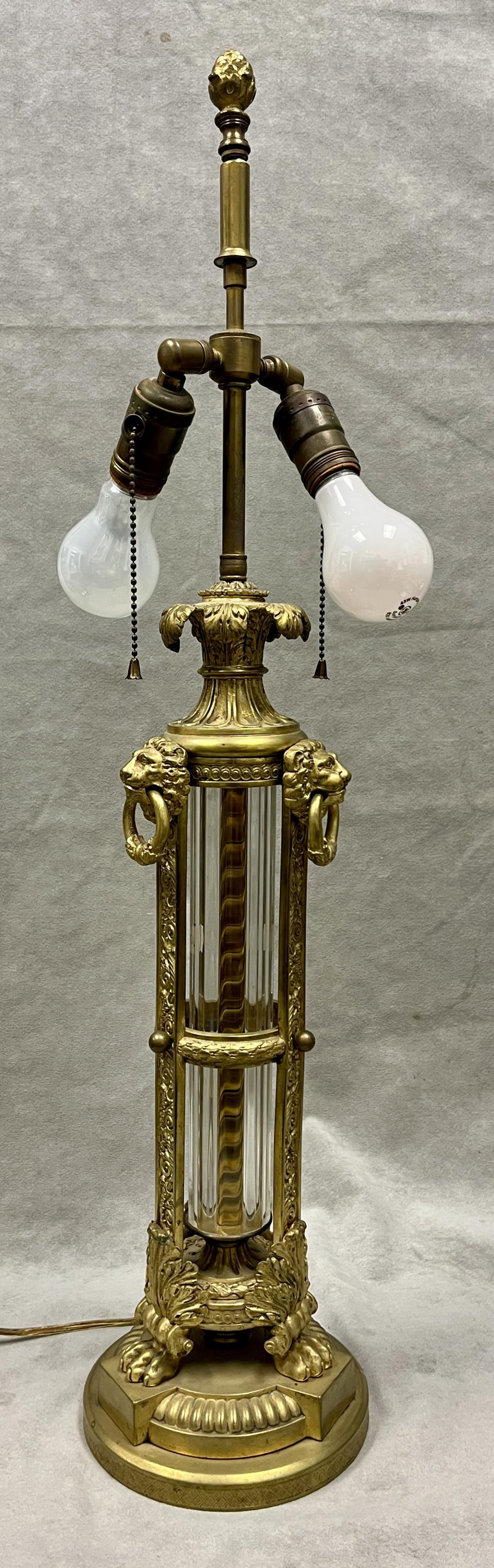 NEOCLASSICAL CAST BRASS AND COLORLESS GLASS COLUMNAR TWO-LIGHT TABLE LAMP - H: 31 inches, to top of (1 of 10)