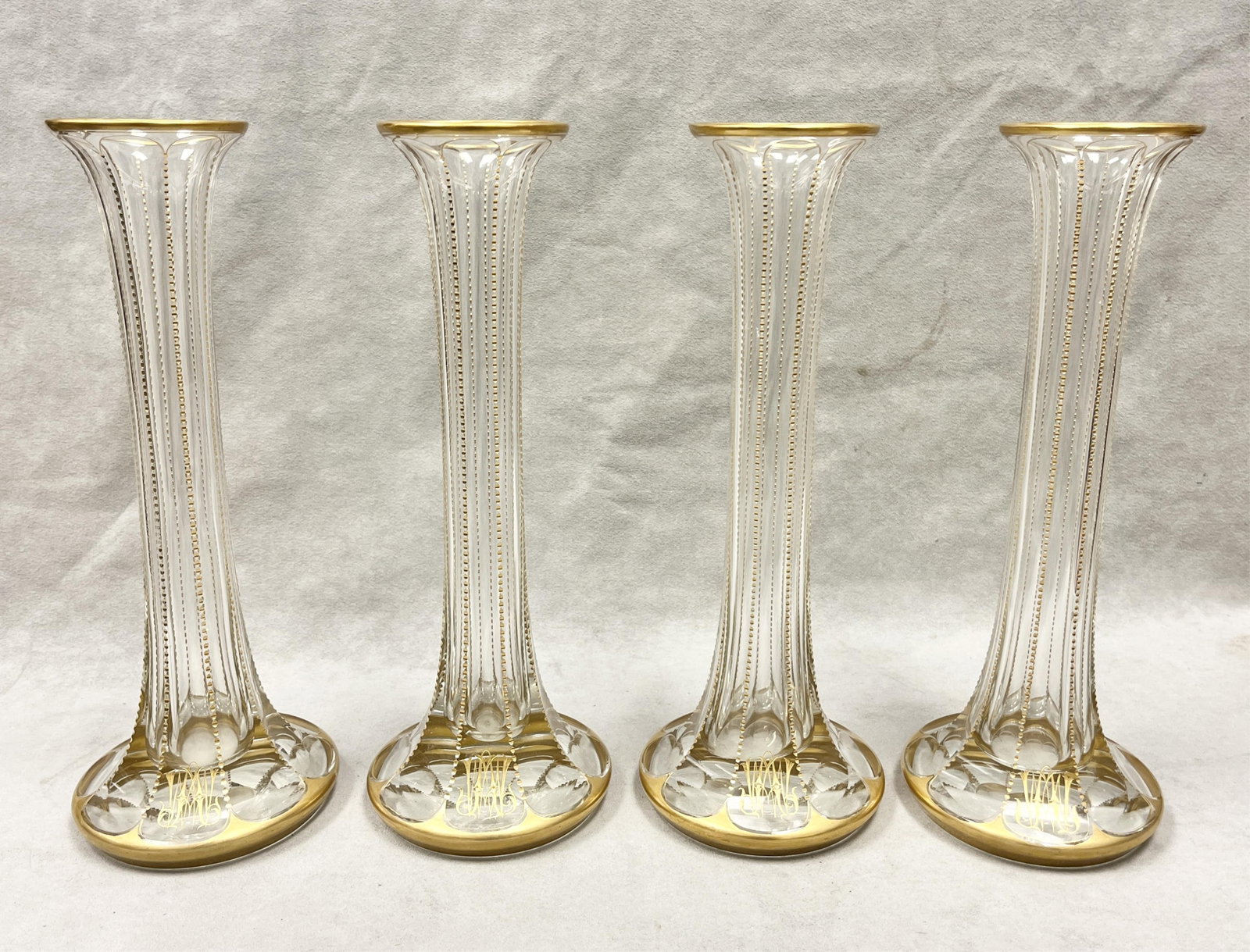 SET OF FOUR PANELED AND ZIPPER-CUT COLORLESS CRYSTAL LILY VASES WITH ORNATE GILT MONOGRAM AND (1 of 5)