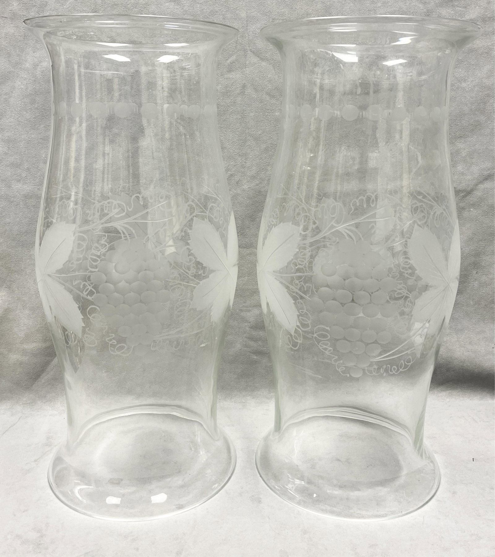 PAIR BLOWN GLASS HURRICANE SHADES WITH ETCHED GRAPE LEAF AND FRUIT DECORATON - H: 20 1/2 in.. (1 of 4)