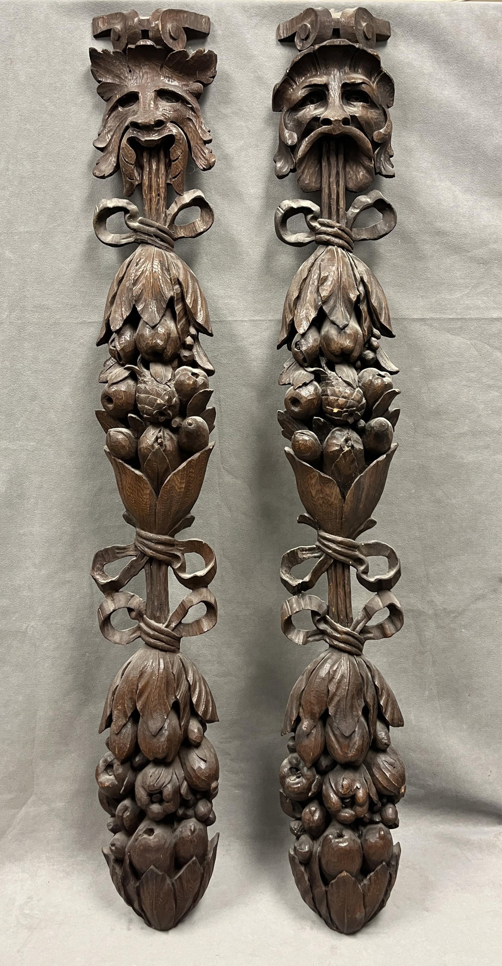 PAIR HIGH-RELIEF CARVED WOODEN MASK-AND-FRUIT WALL APPLIQUES - H: 44 3/4 inches.. (1 of 9)