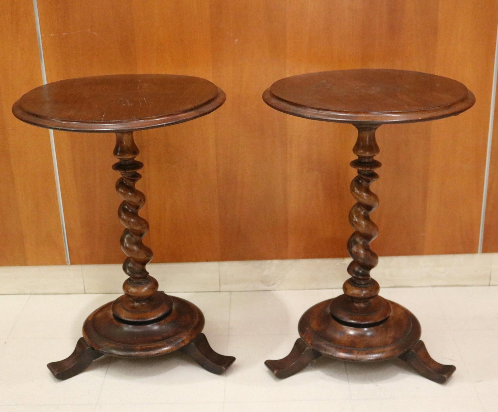 PAIR ENGLISH CIRCULAR-TOP STANDS WITH BARLEY-TWIST PEDESTAL BASES 19th century - H: 27 1/2 IN; D: 19: PAIR ENGLISH CIRCULAR-TOP STANDS WITH BARLEY-TWIST PEDESTAL BASES 19th century . H: 27 1/2 IN; D: 19 1/2 IN PROVENANCE: ?Merry Hill?, an historic mansion built in 1899 and located in Greenspring Valle