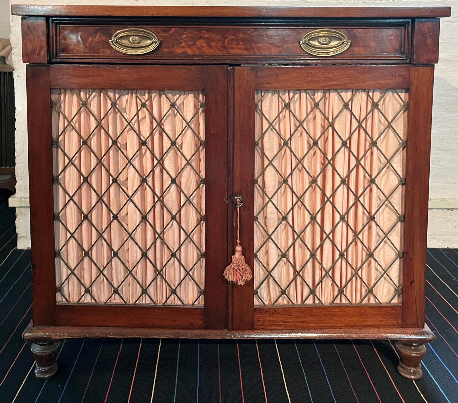 ENGLISH REGENCY MAHOGANY GRILL-FRONT TWO-DOOR CABINET - H: 35 IN; W: 37 1/2 IN; D: 14 IN. (1 of 5)