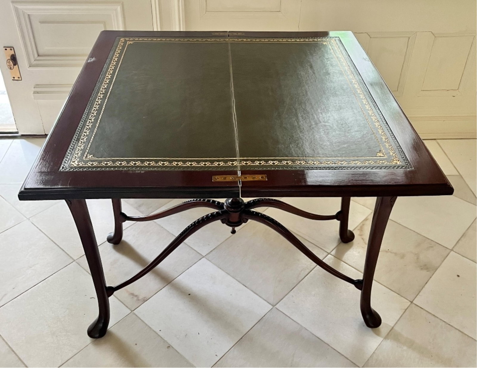 GEORGE III CARVED MAHOGANY FOLDING SWIVEL-TOP CARD TABLE - H: 28 in.; W; 32 in.; D: 15 1/2 in.. (1 of 7)